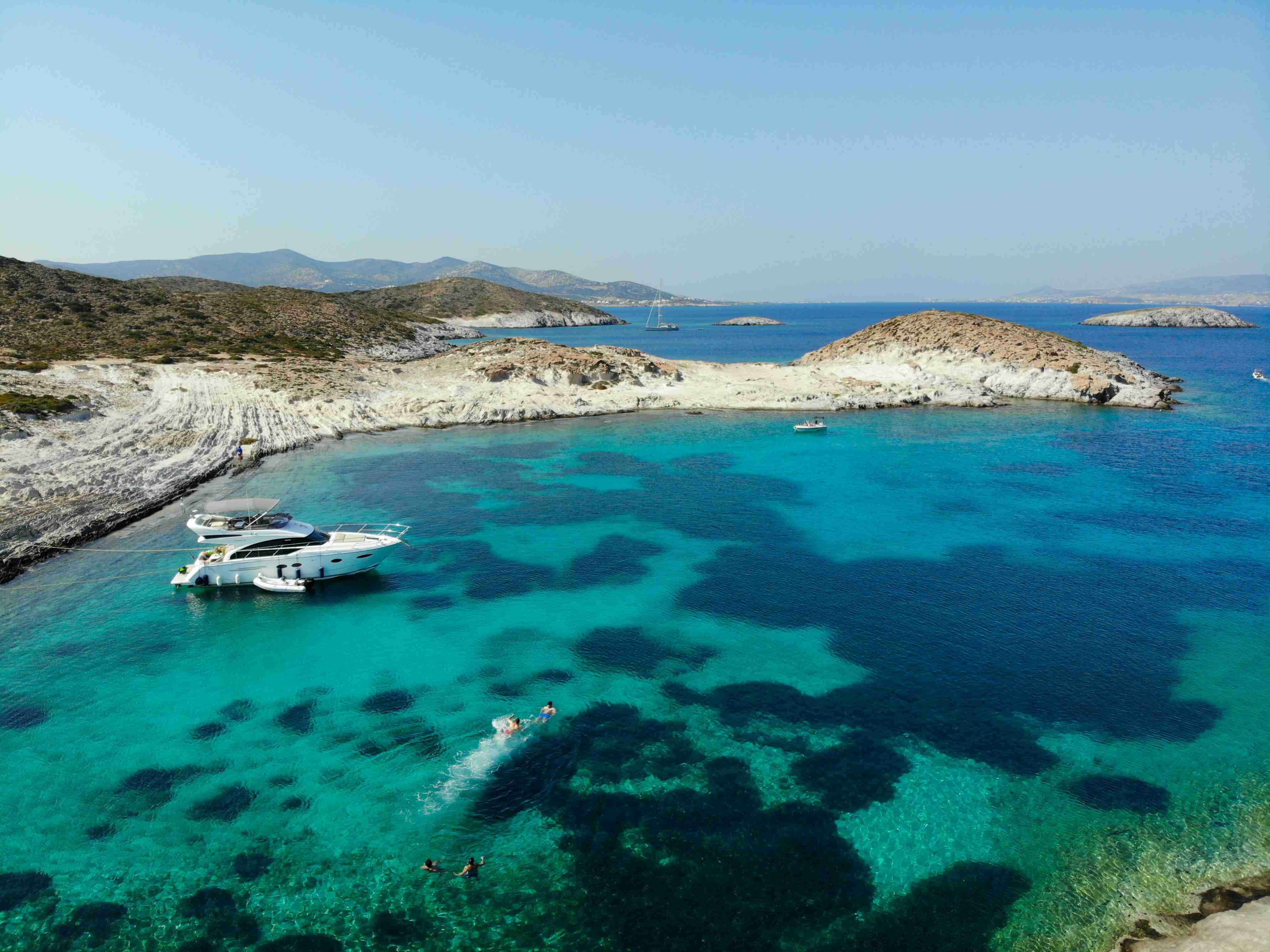 Aerial View of Crystal Blue Waters and Boats