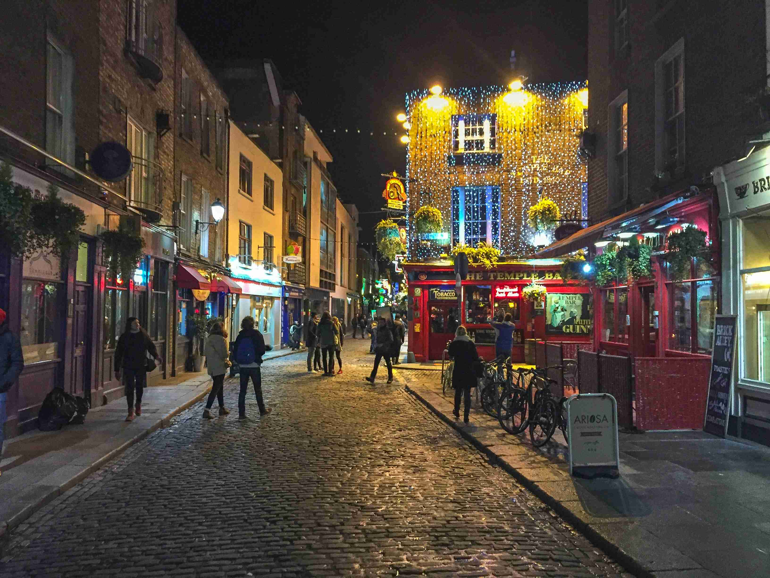 Cobblestone Street and Twinkling Lights at Dusk