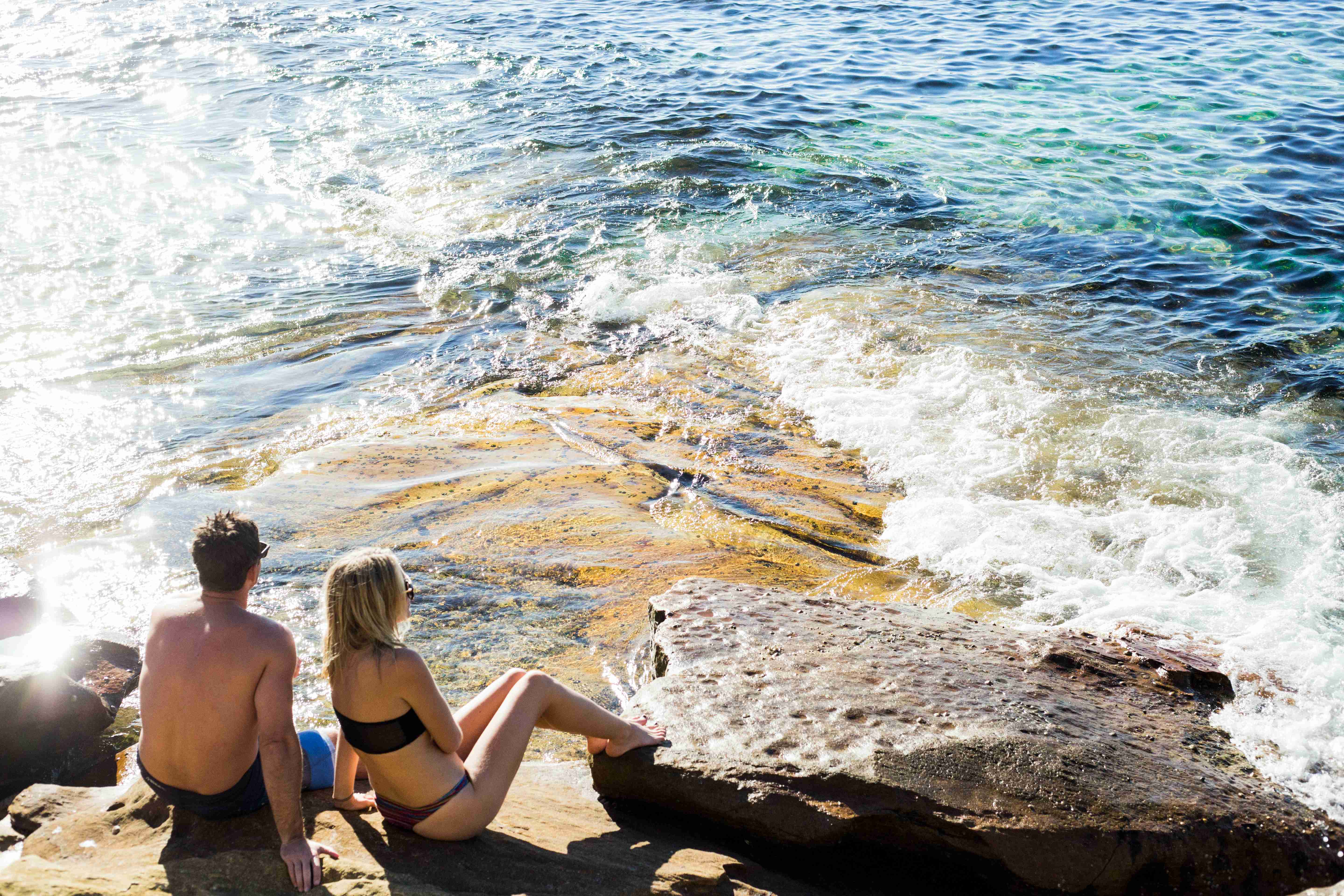 Couple Enjoying Seaside Sunshine
