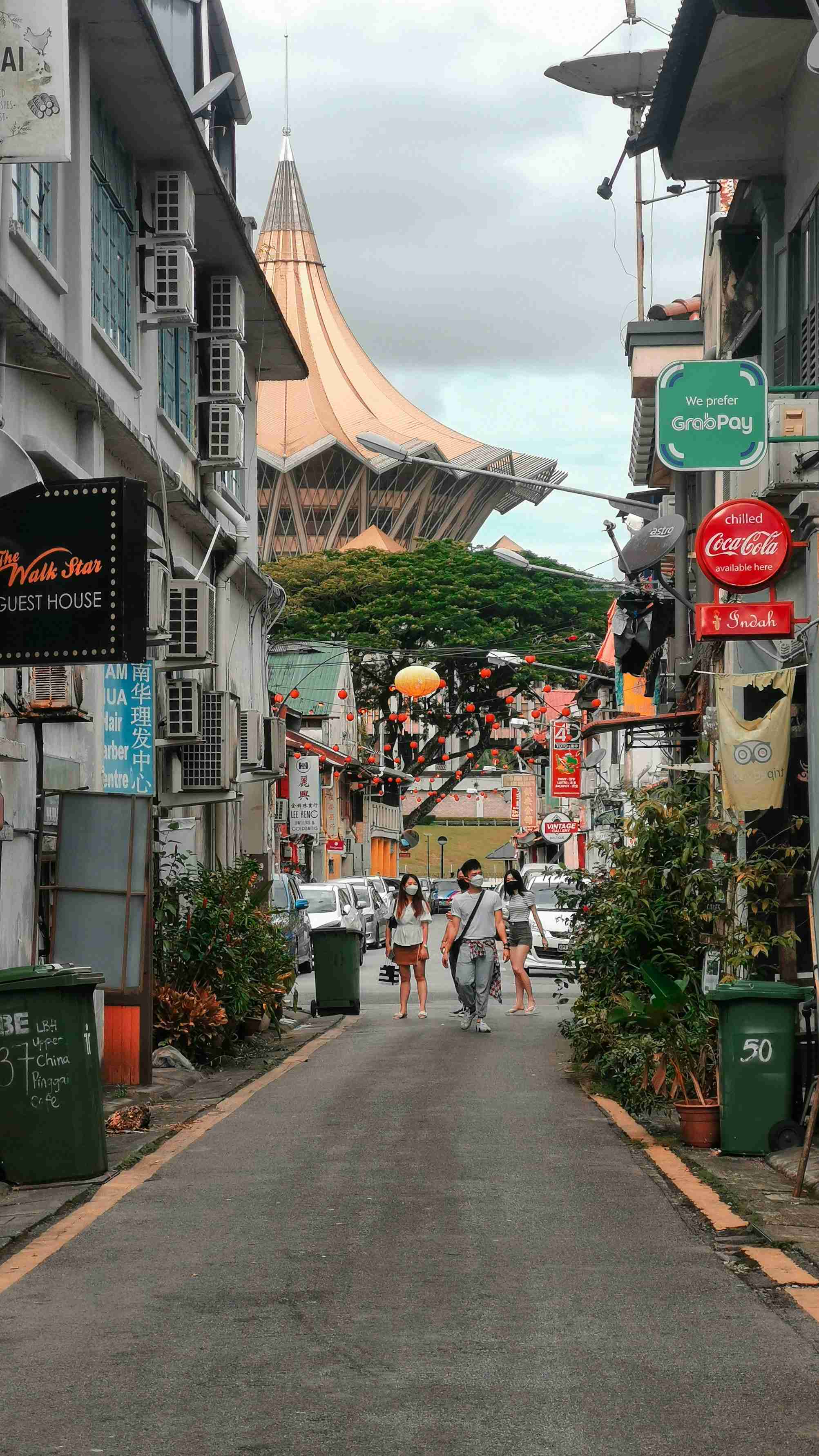 Cultural Fusion Street Scene with Iconic Roof Structure