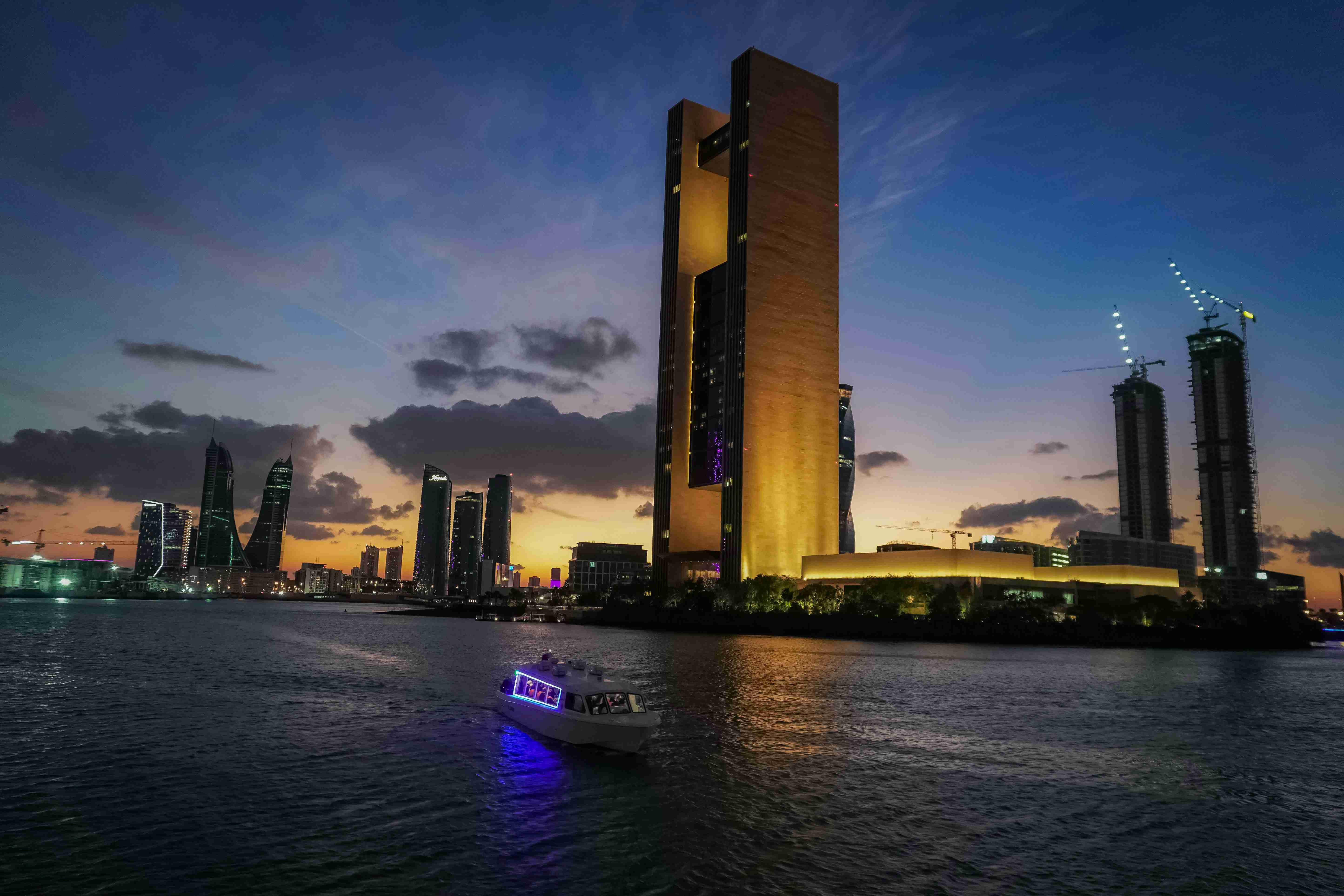Dusk Skyline With BoatIn Bahrain