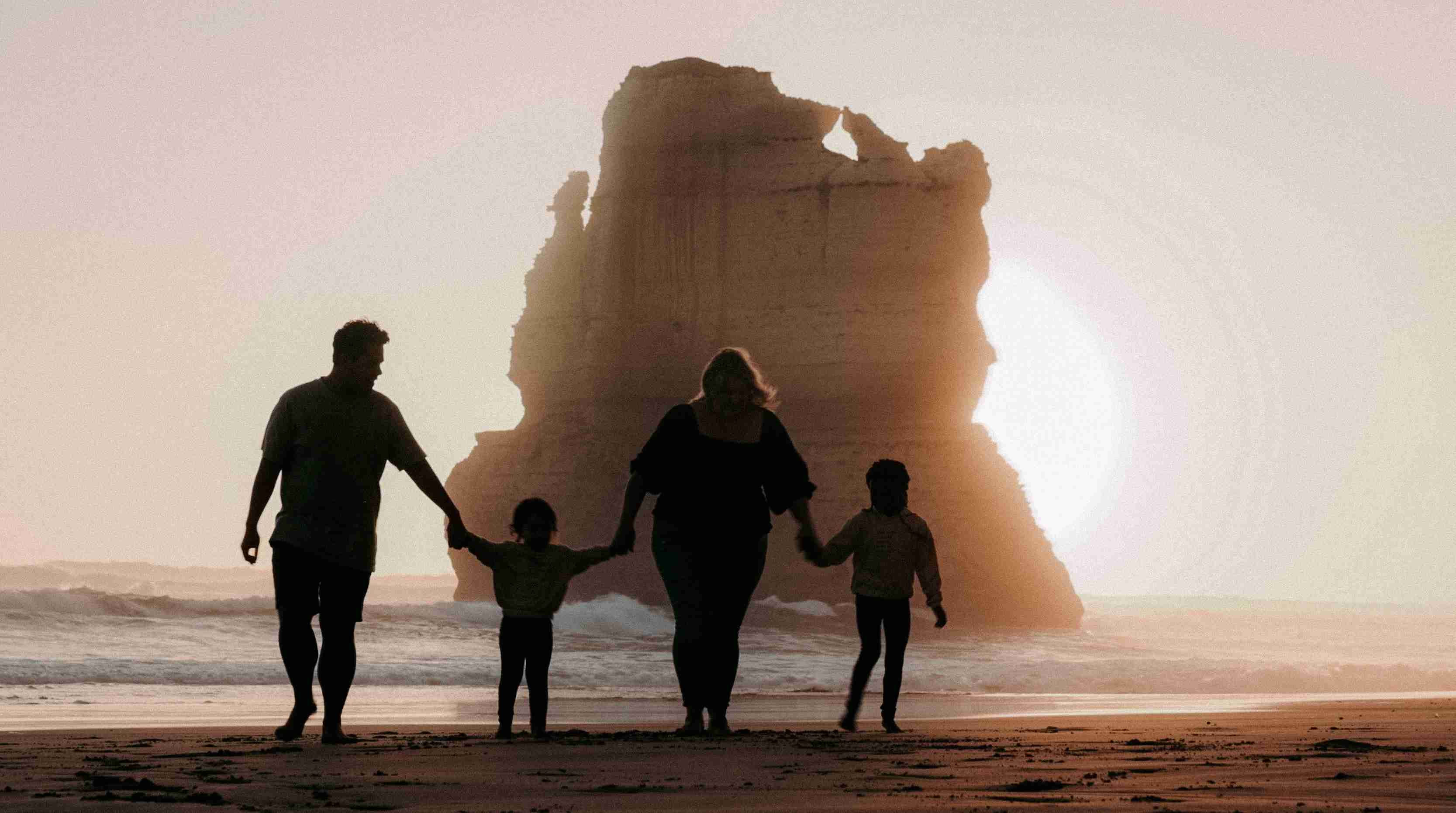 Family Beach Walk at Sunset