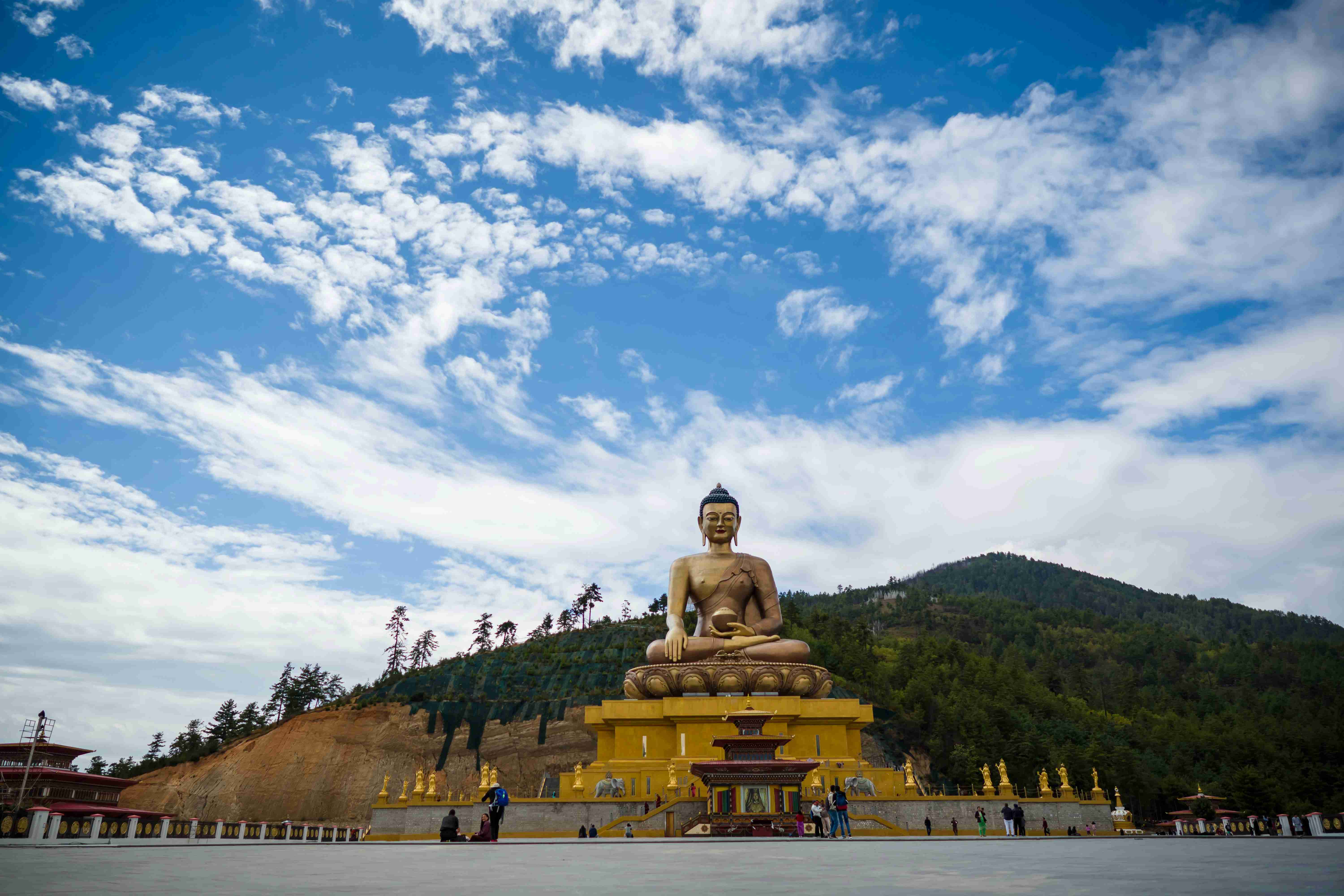 Giant Buddha Statue Under Blue Sky