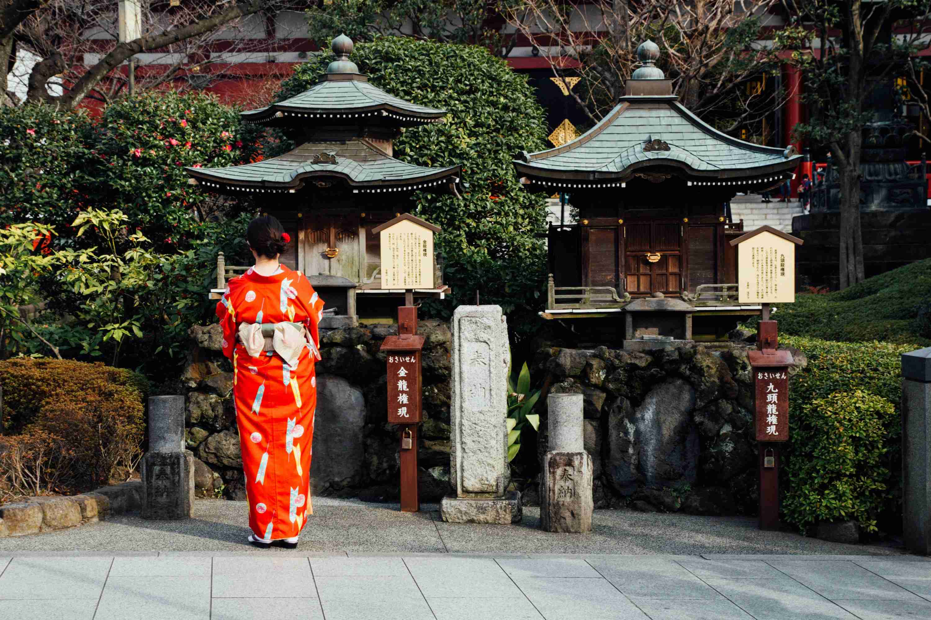 Kimono Clad Woman At Traditional Shrine