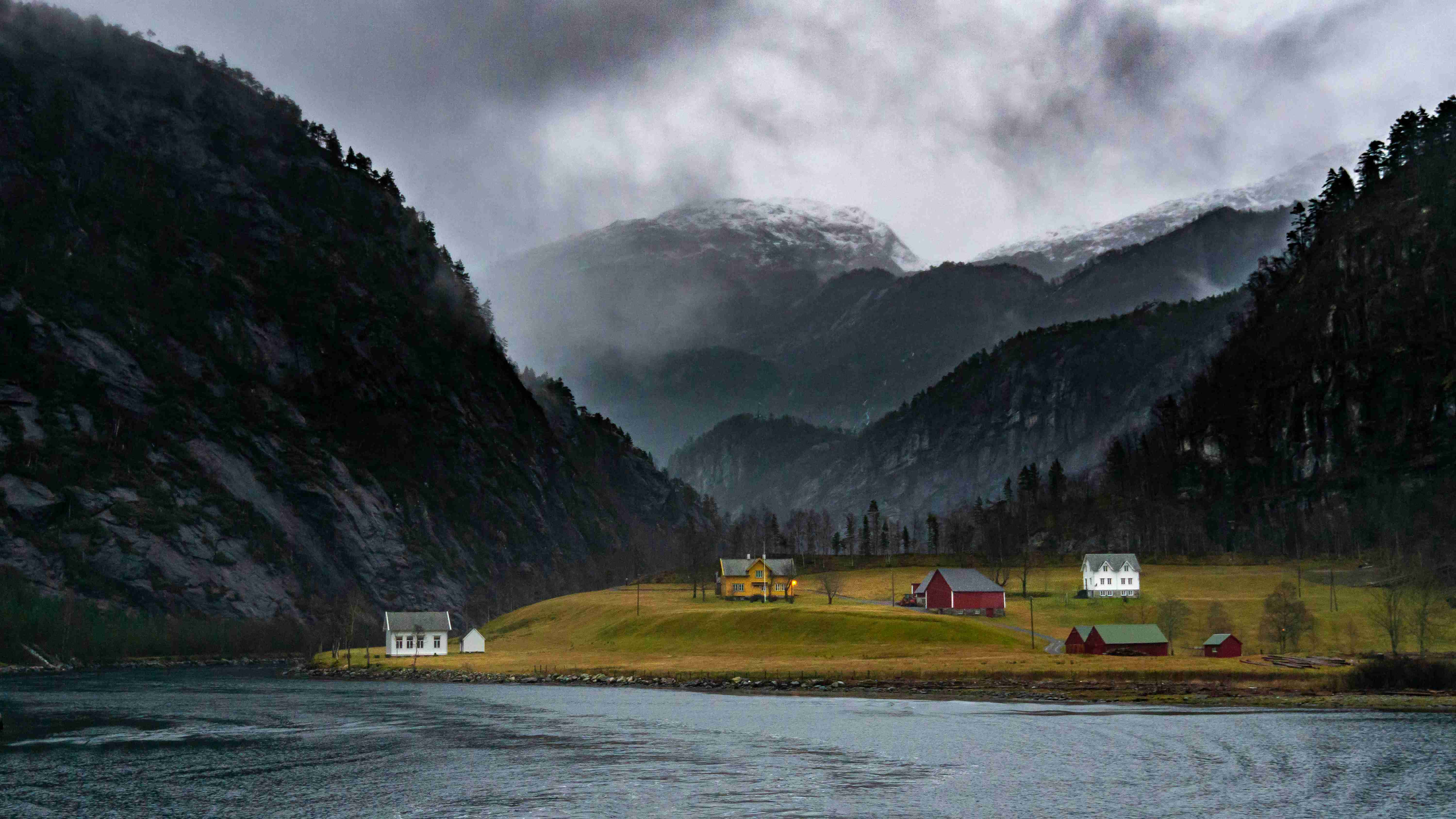 Misty Fjord with Cliffside Houses Norveška