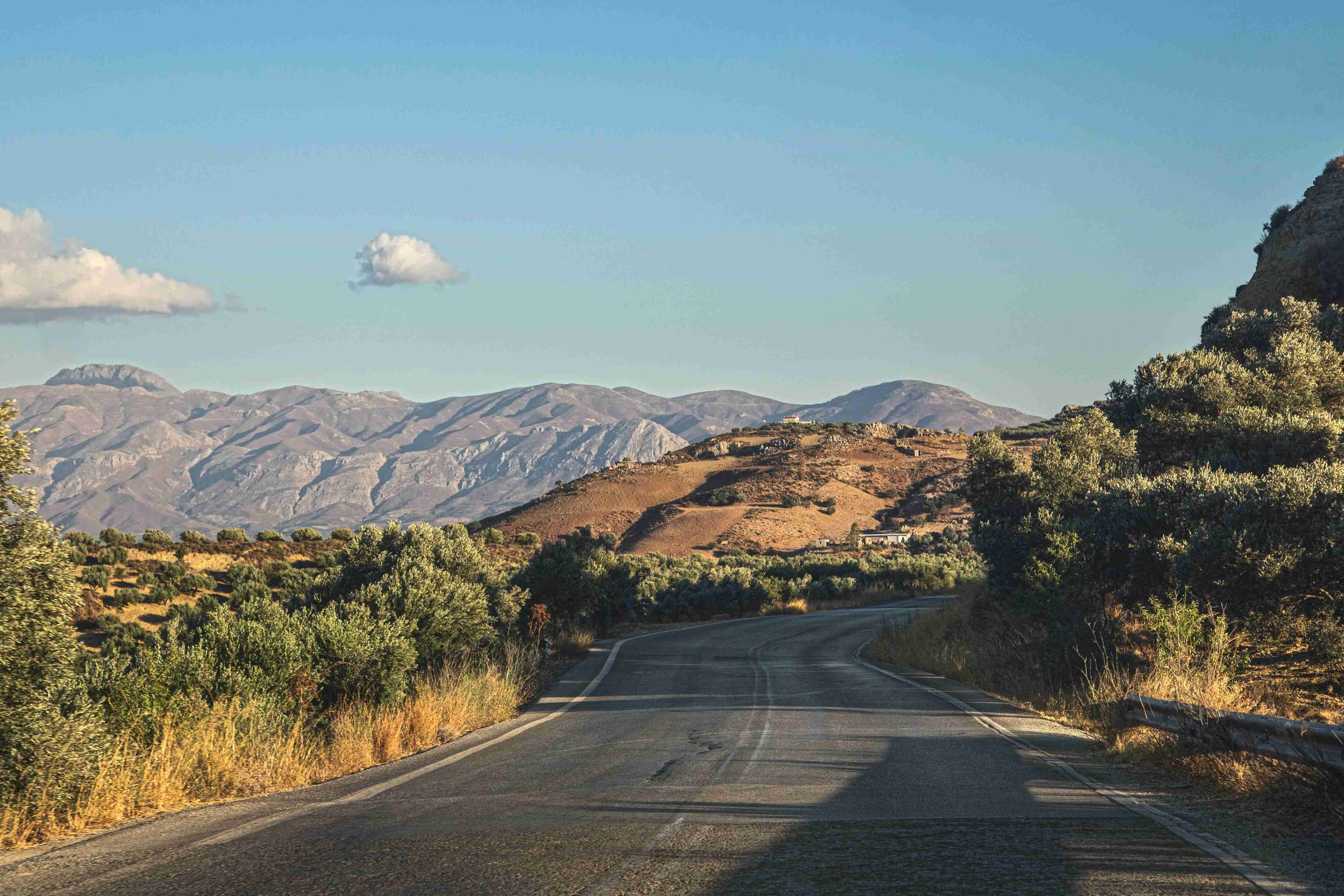 Rural Road Towards Mountain Range