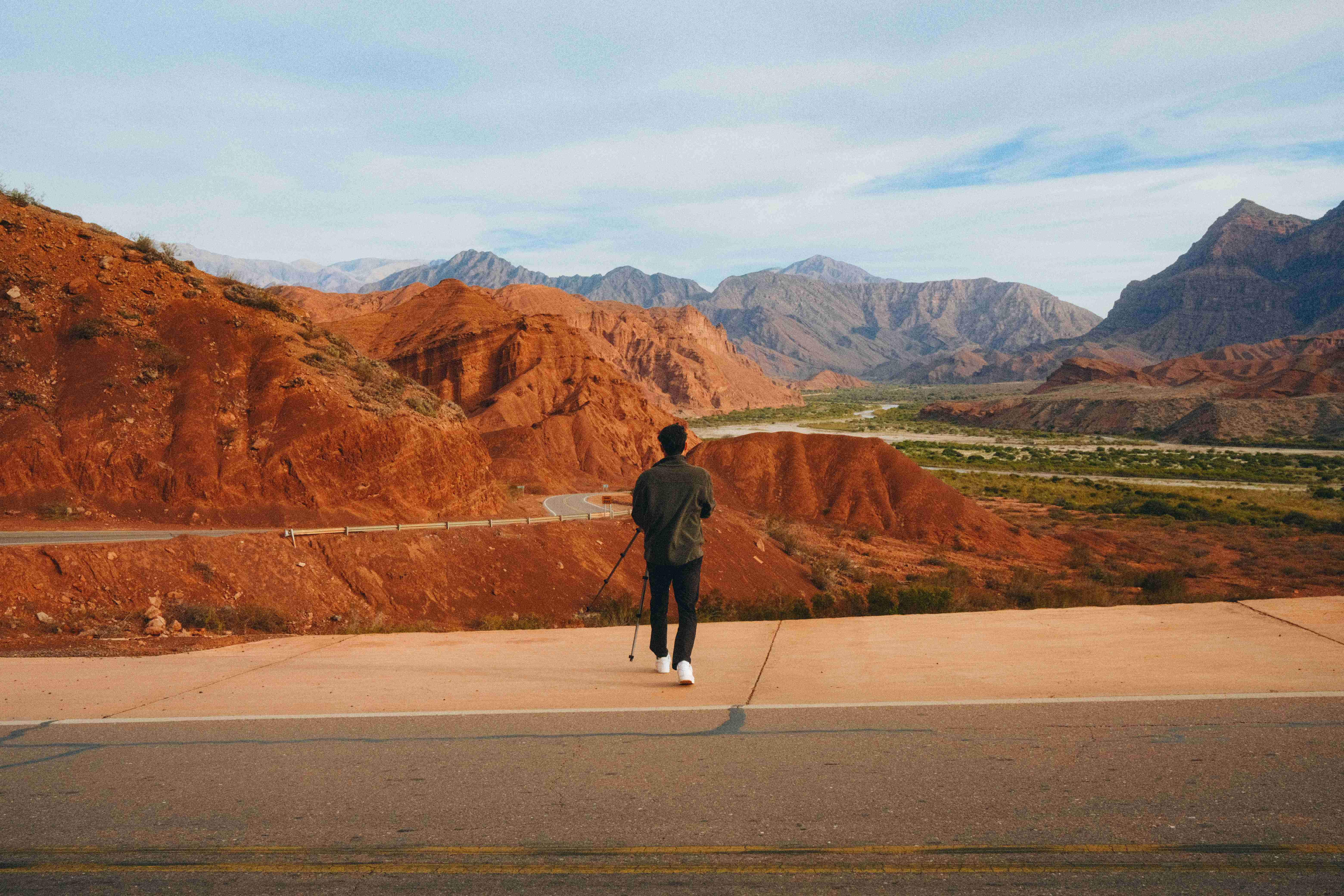Solo Traveler Adventuring in Red Canyon Landscape