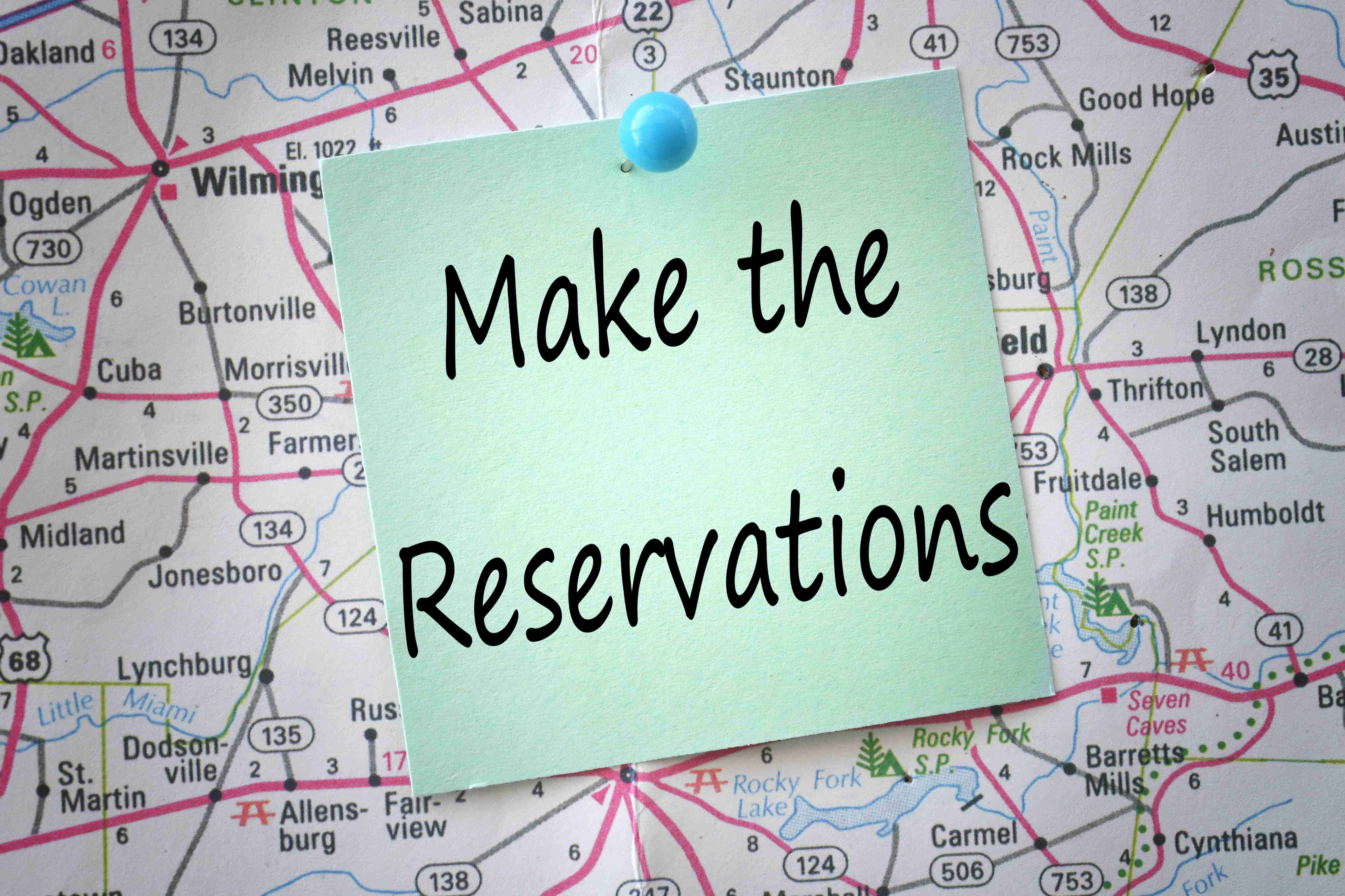 A green note saying Make the Reservations pinned to a map