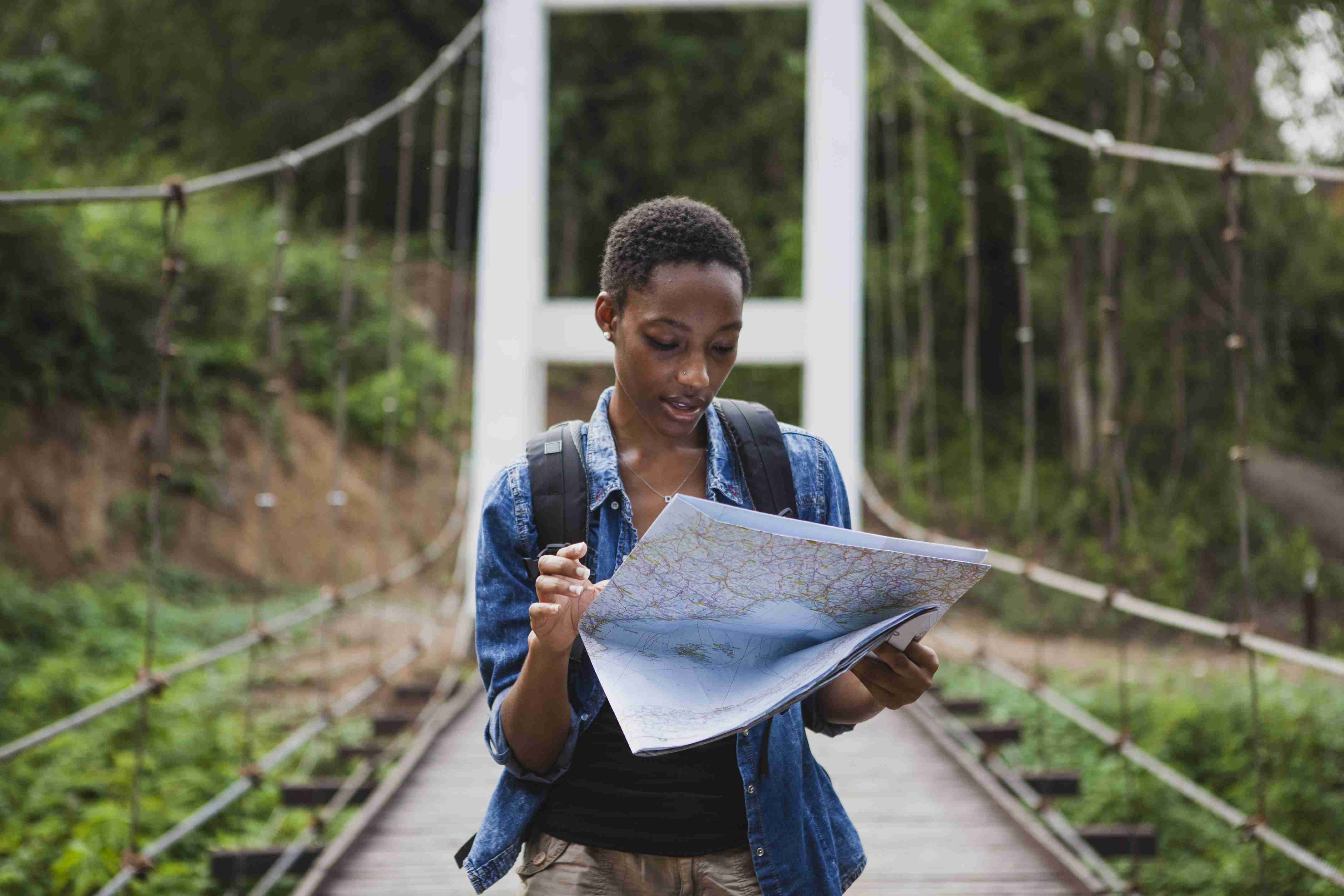 african-american-woman-looking-at-a-map-travel