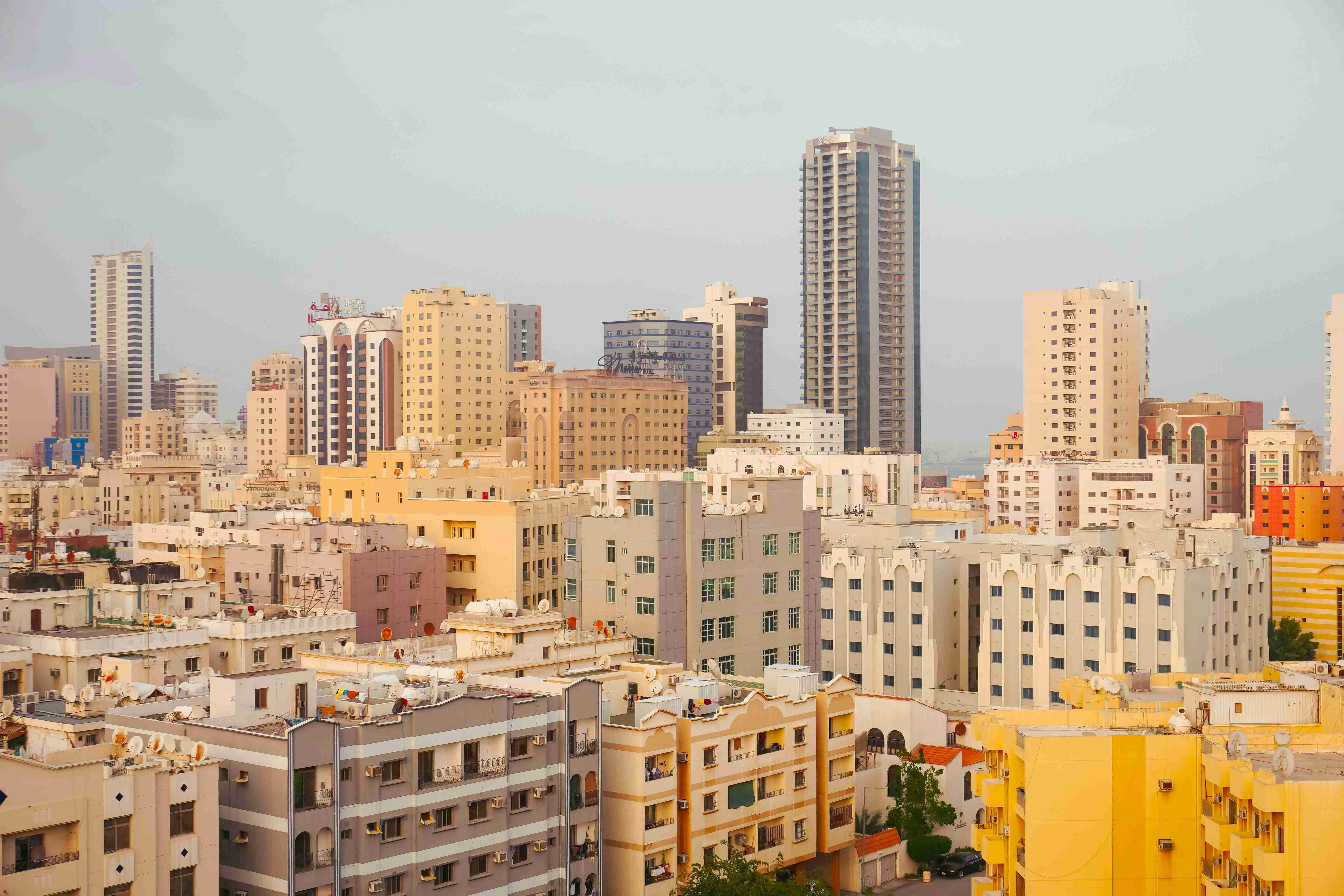 a view of a city with tall buildings