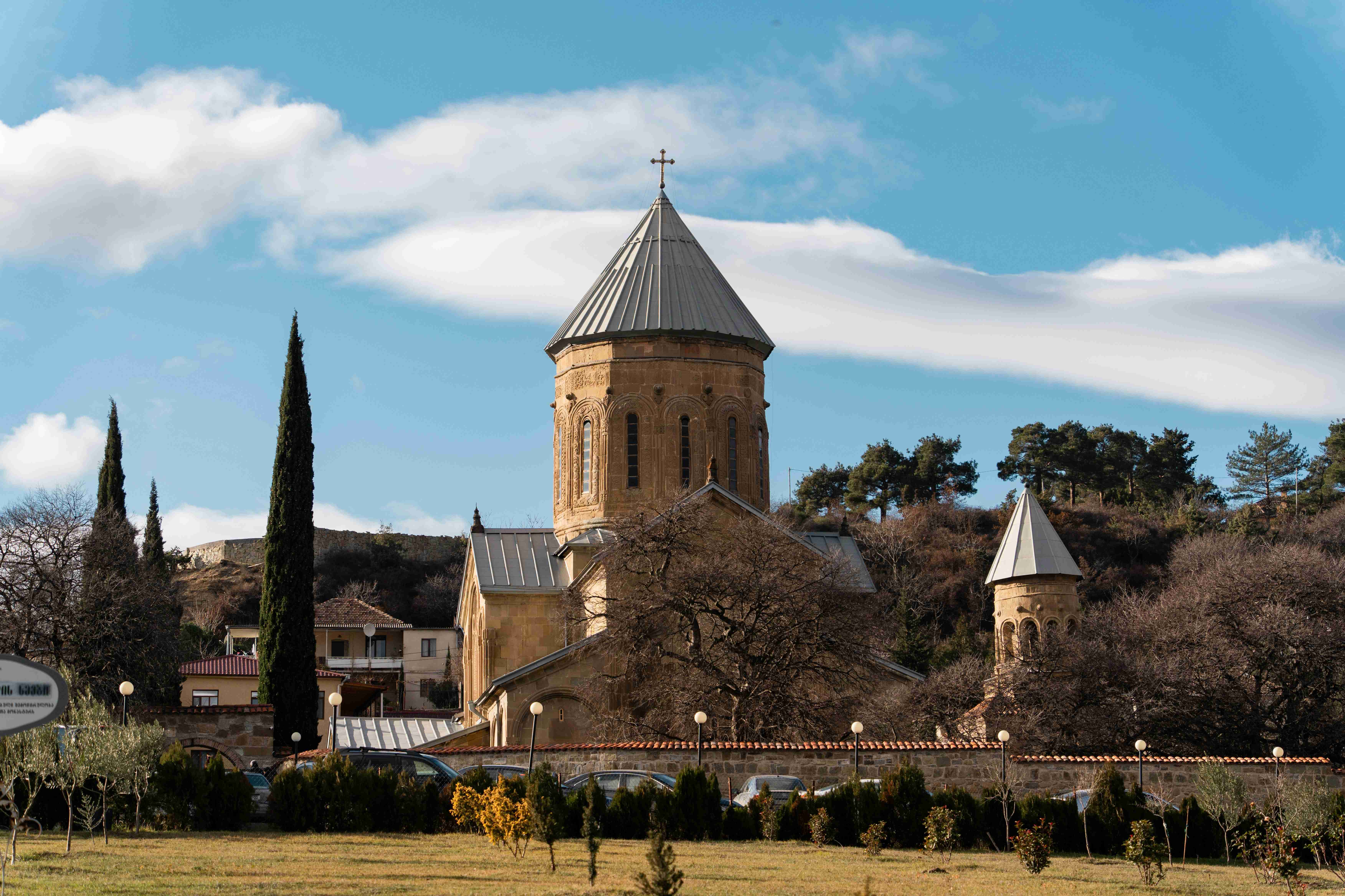a-church-with-a-steeple-and-a-clock-tower