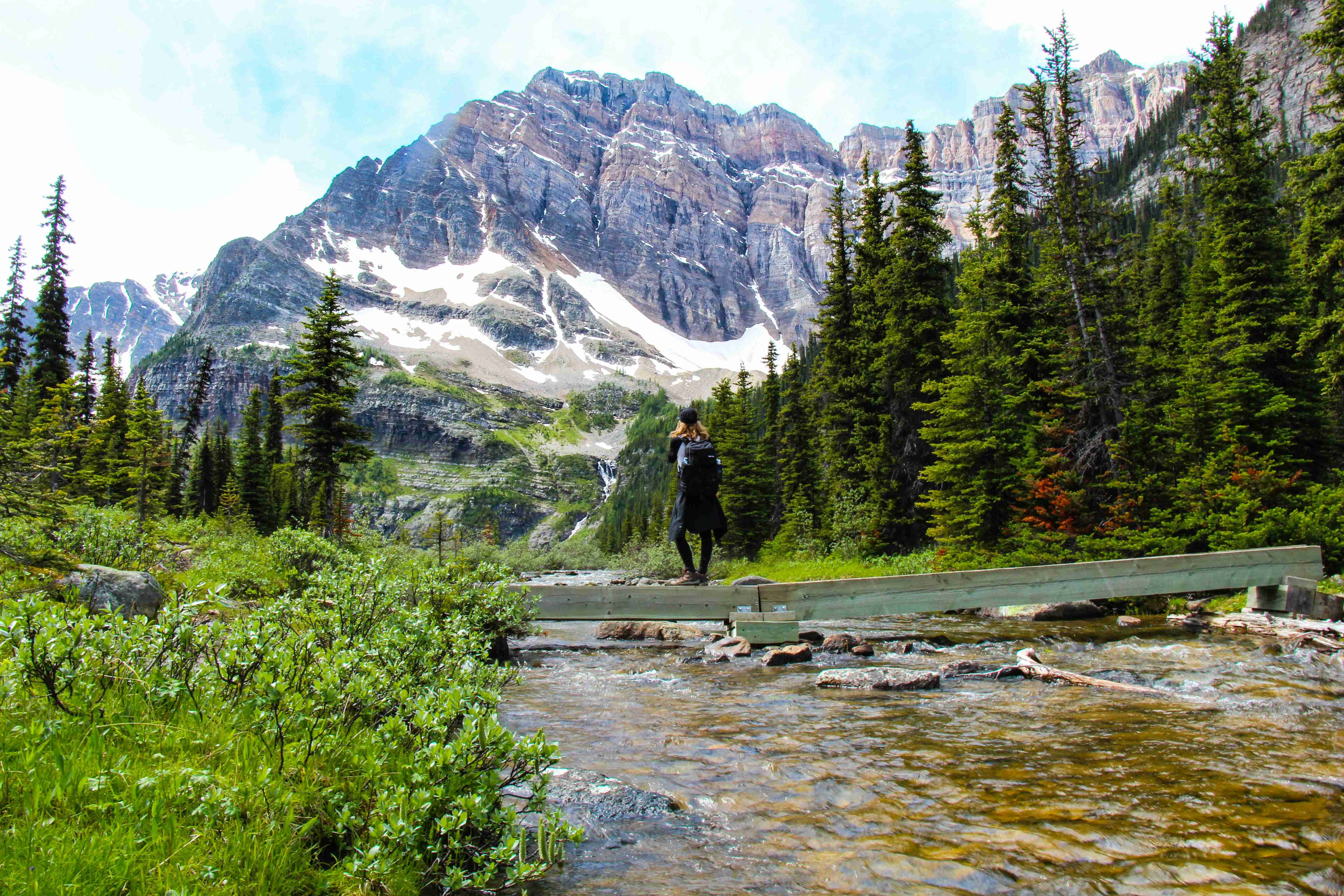 person standing near lake
