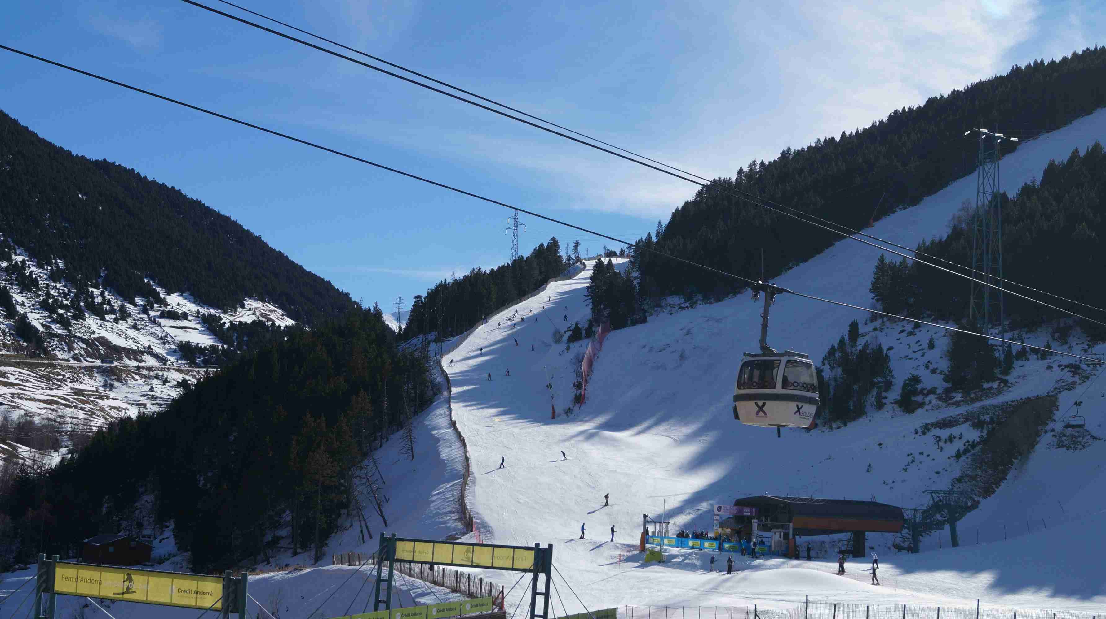cable-cars-over-snow-covered-mountain-during-daytime