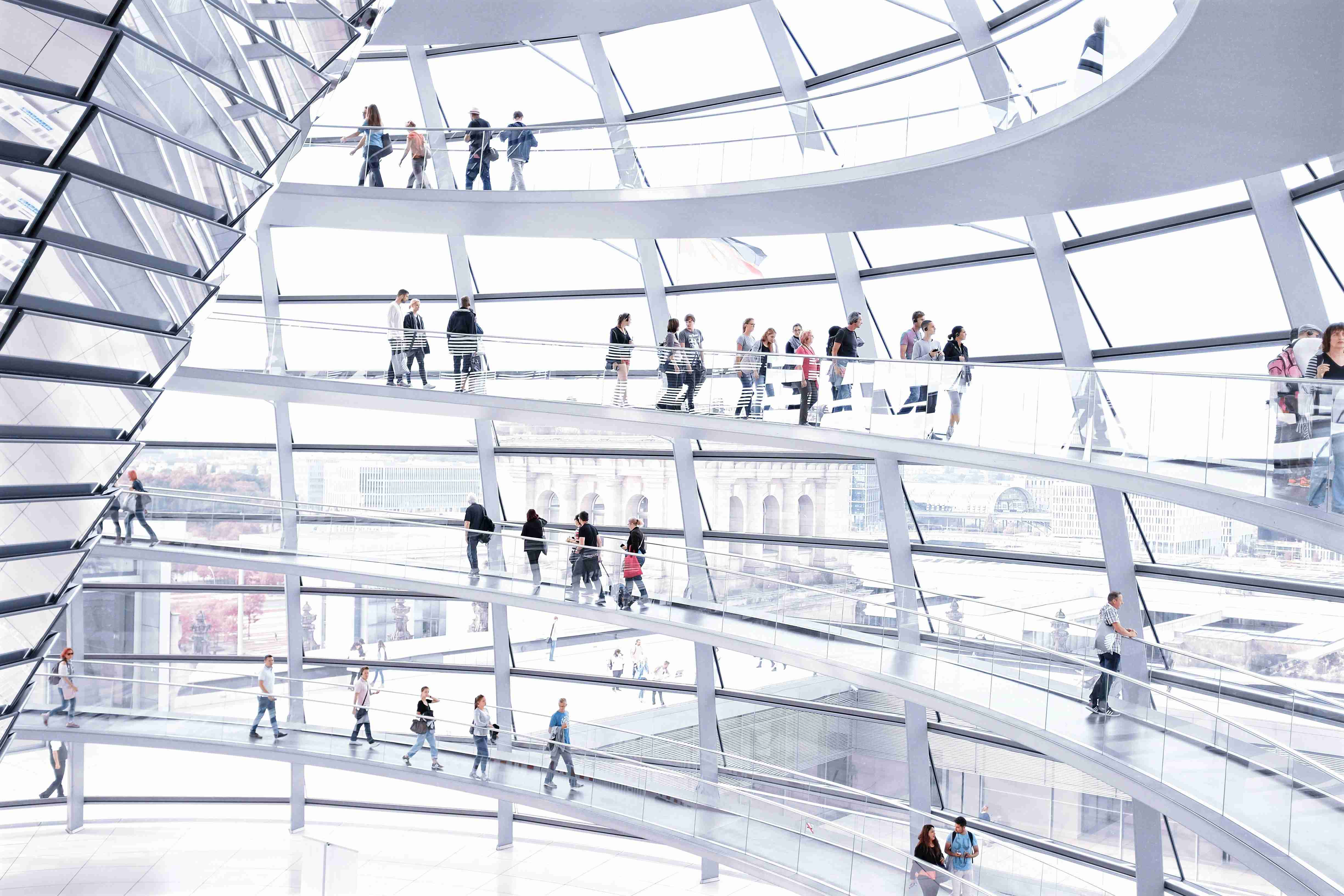 people-walking-inside-white-building