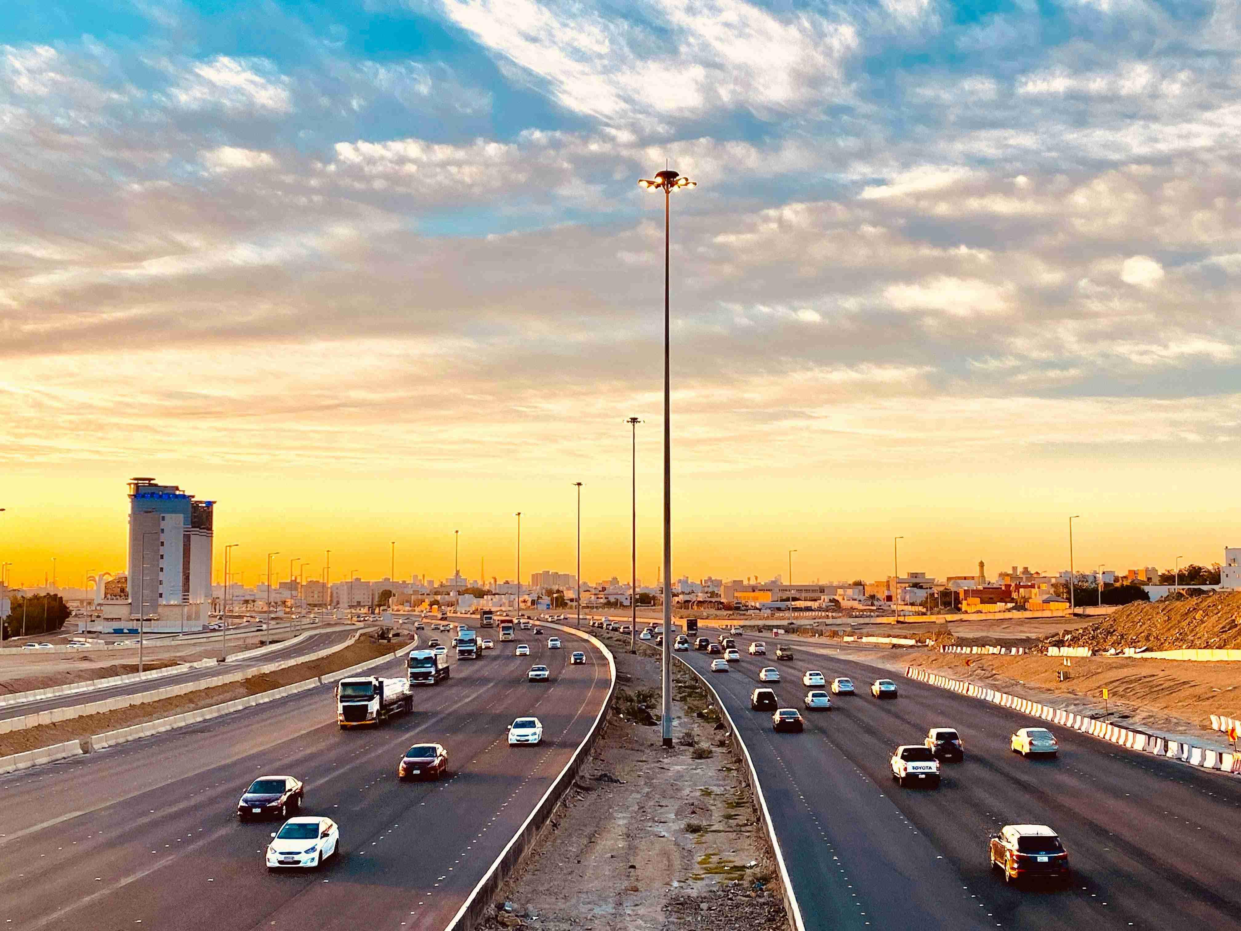 Cars on a Busy Highway at Sunset