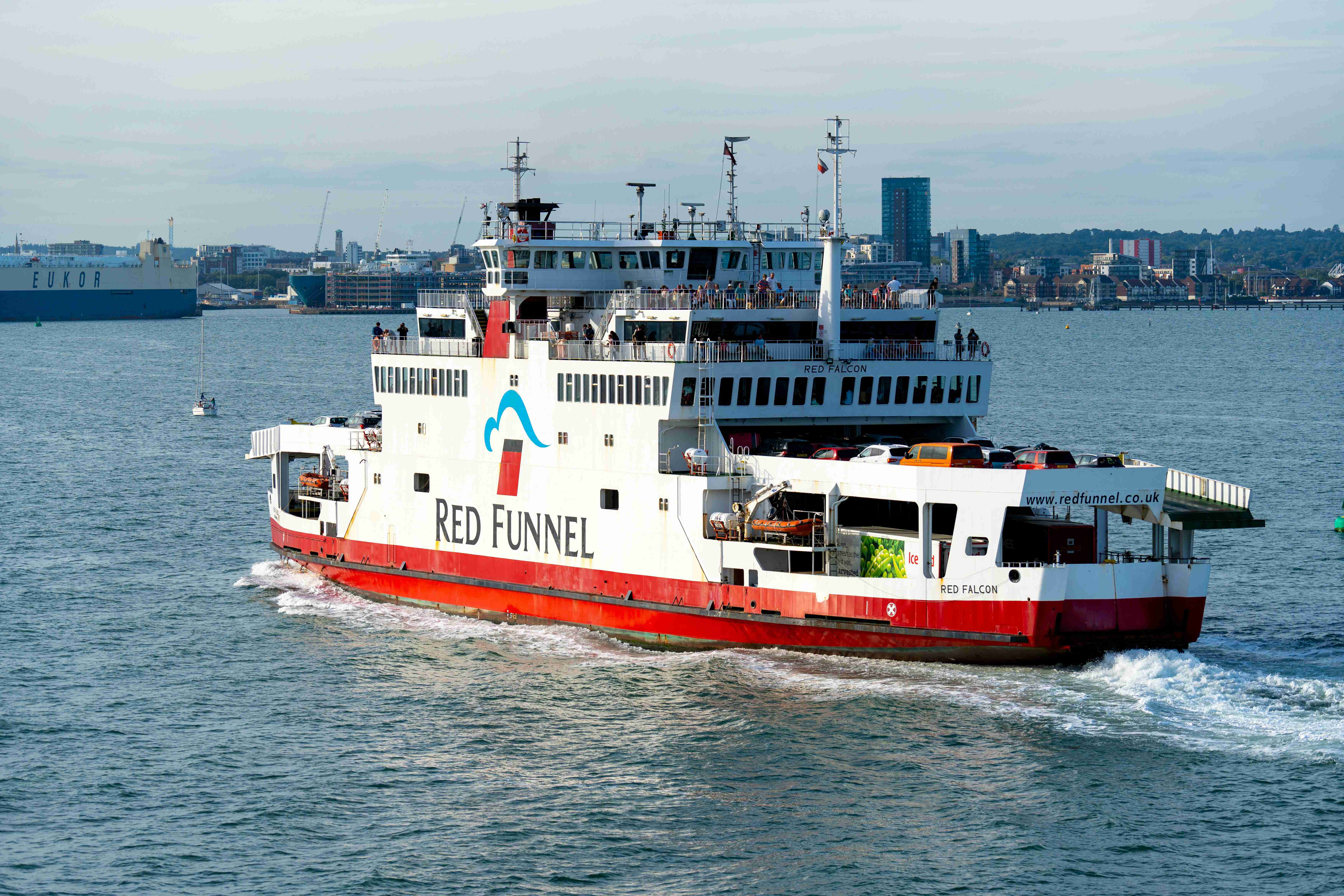 a red and white ferry boat