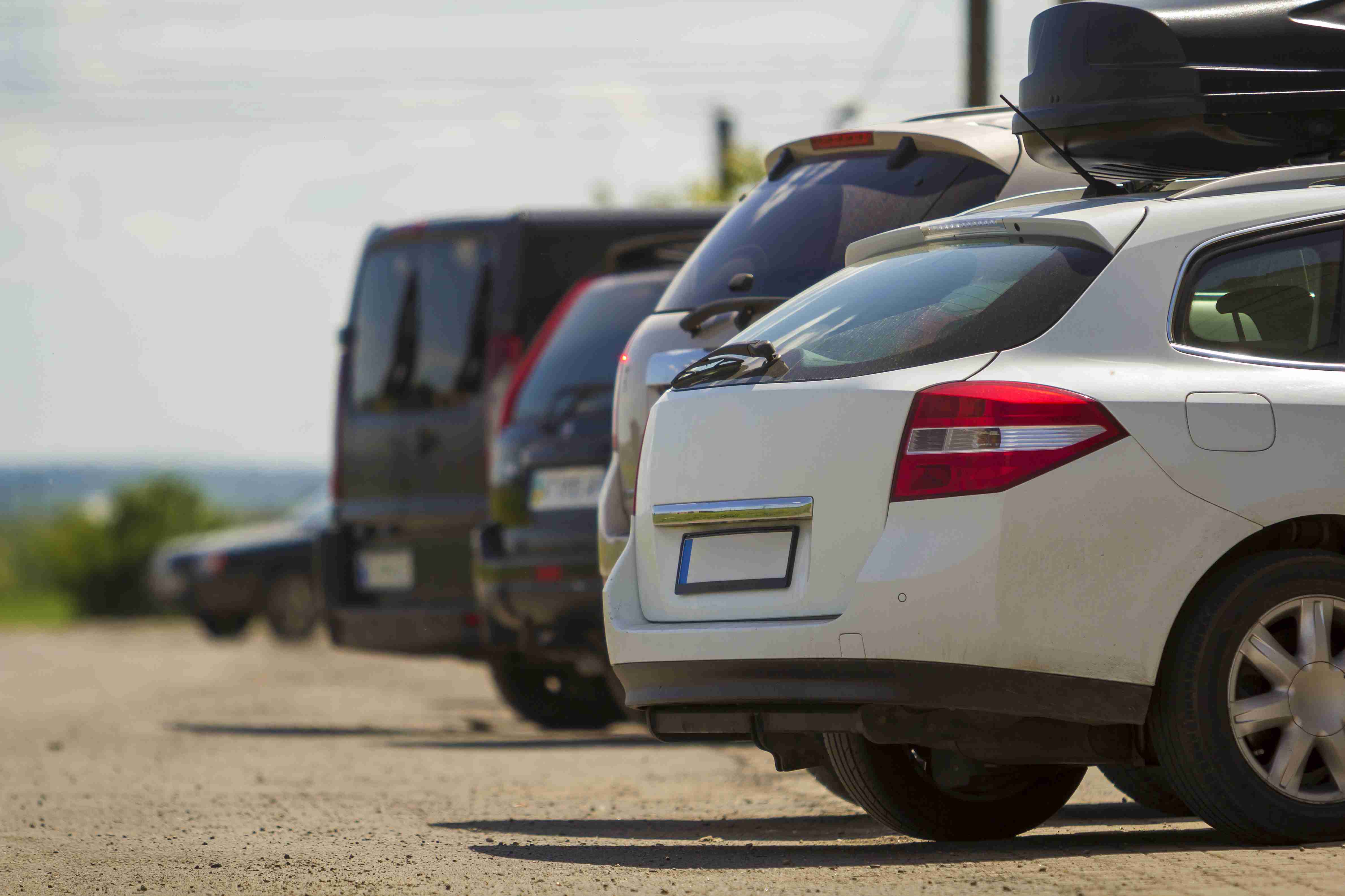 Close-up back view of white expensive modern car
