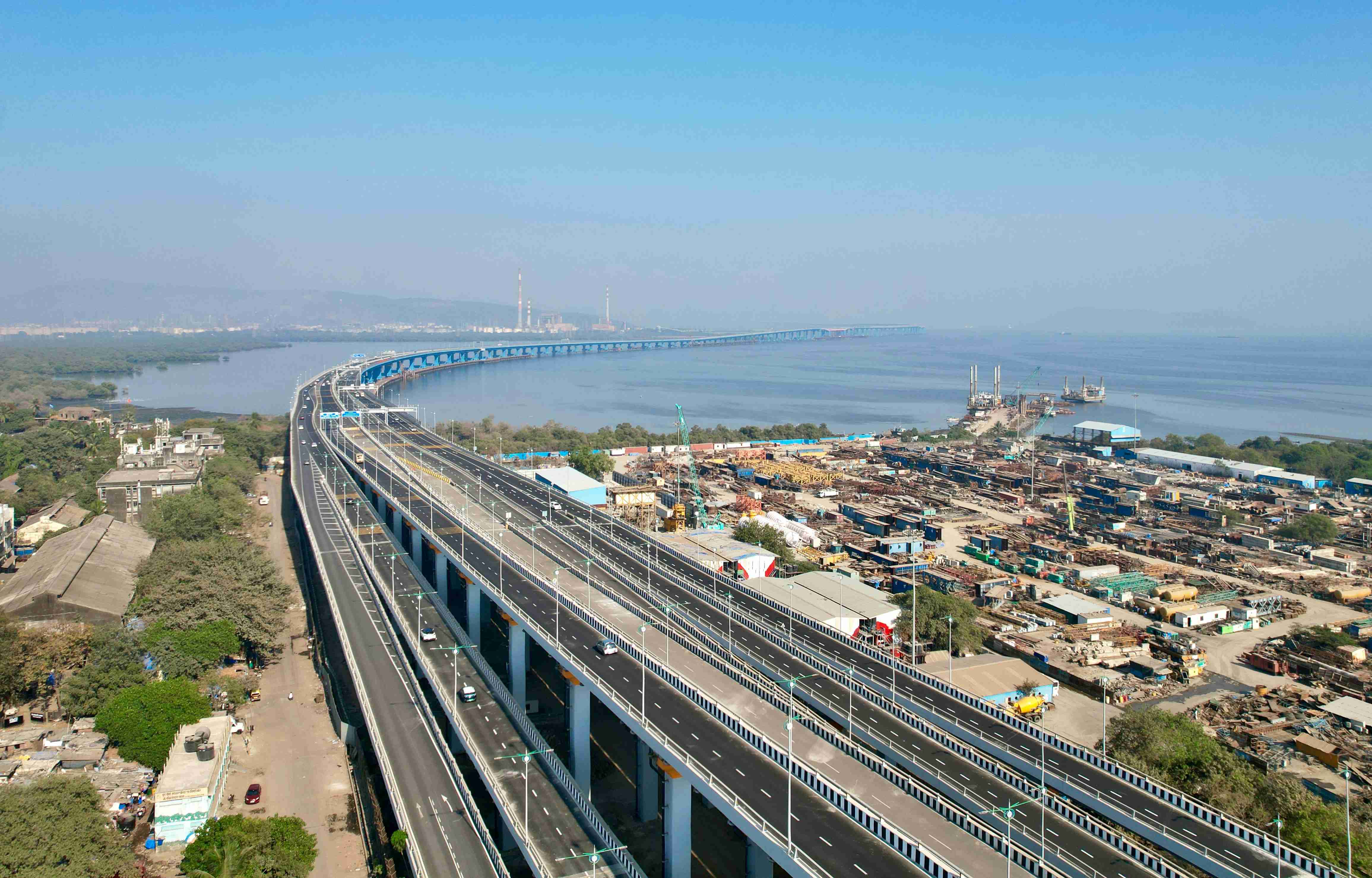 an-aerial-view-of-a-highway-with-a-bridge