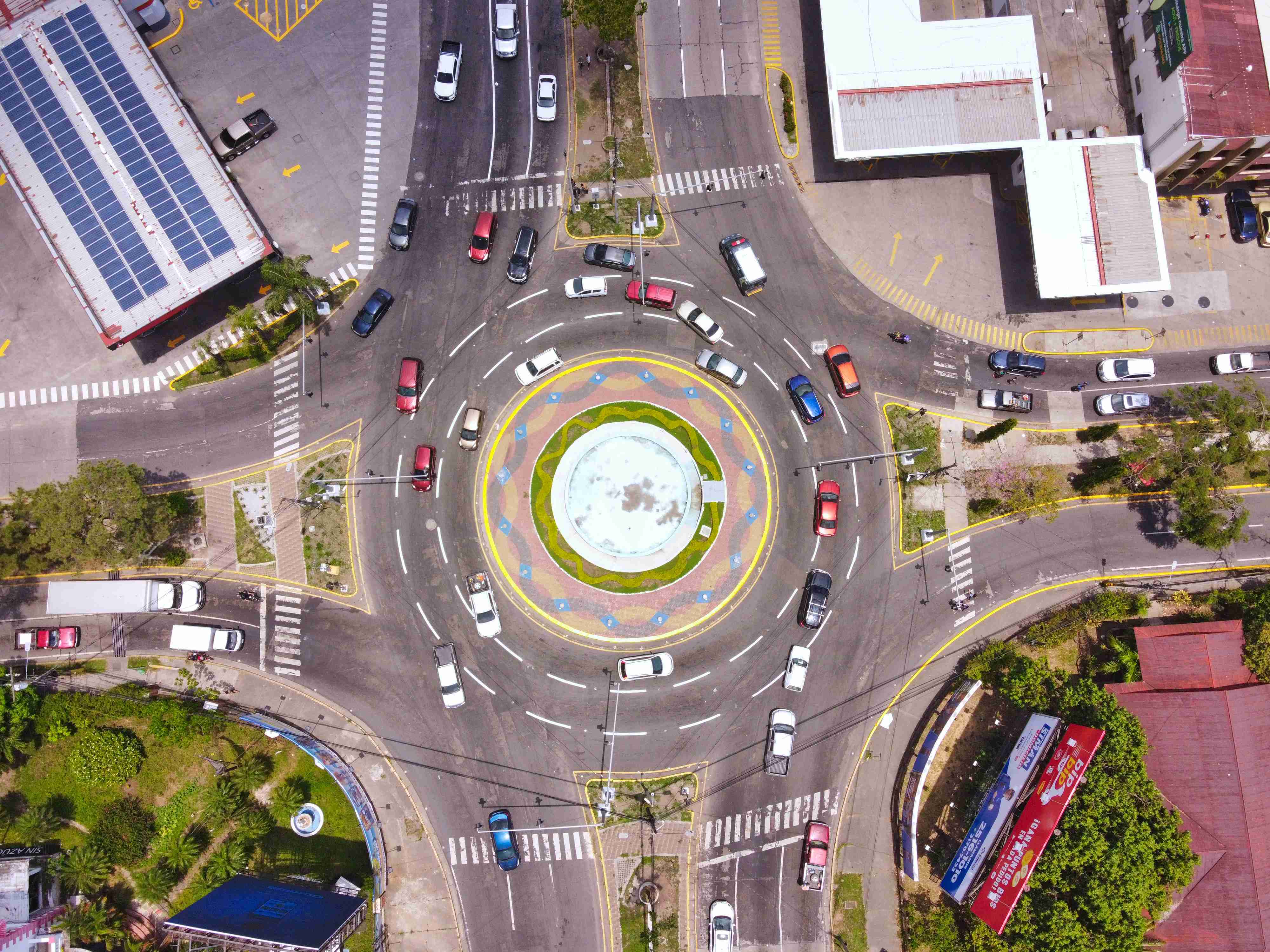an-aerial-view-of-a-city-intersection-with-cars