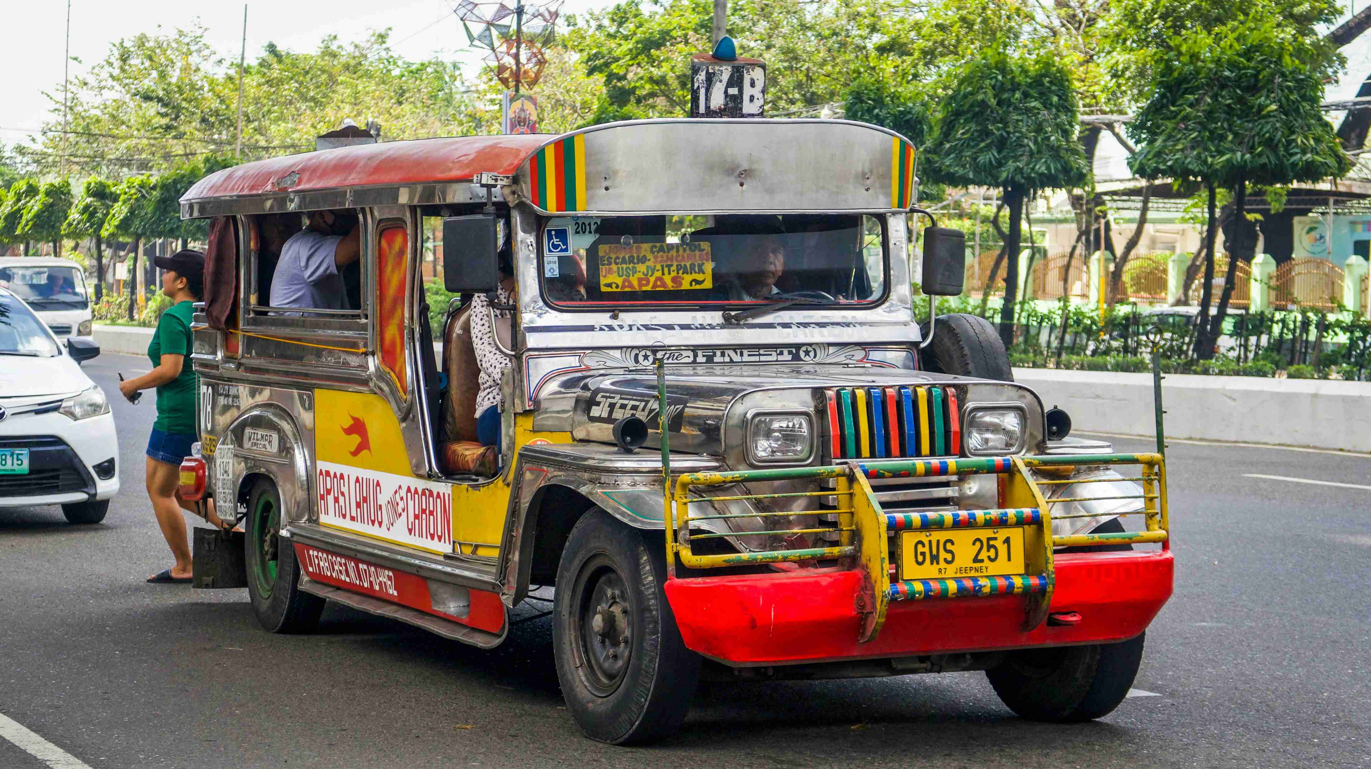 white and red truck on road