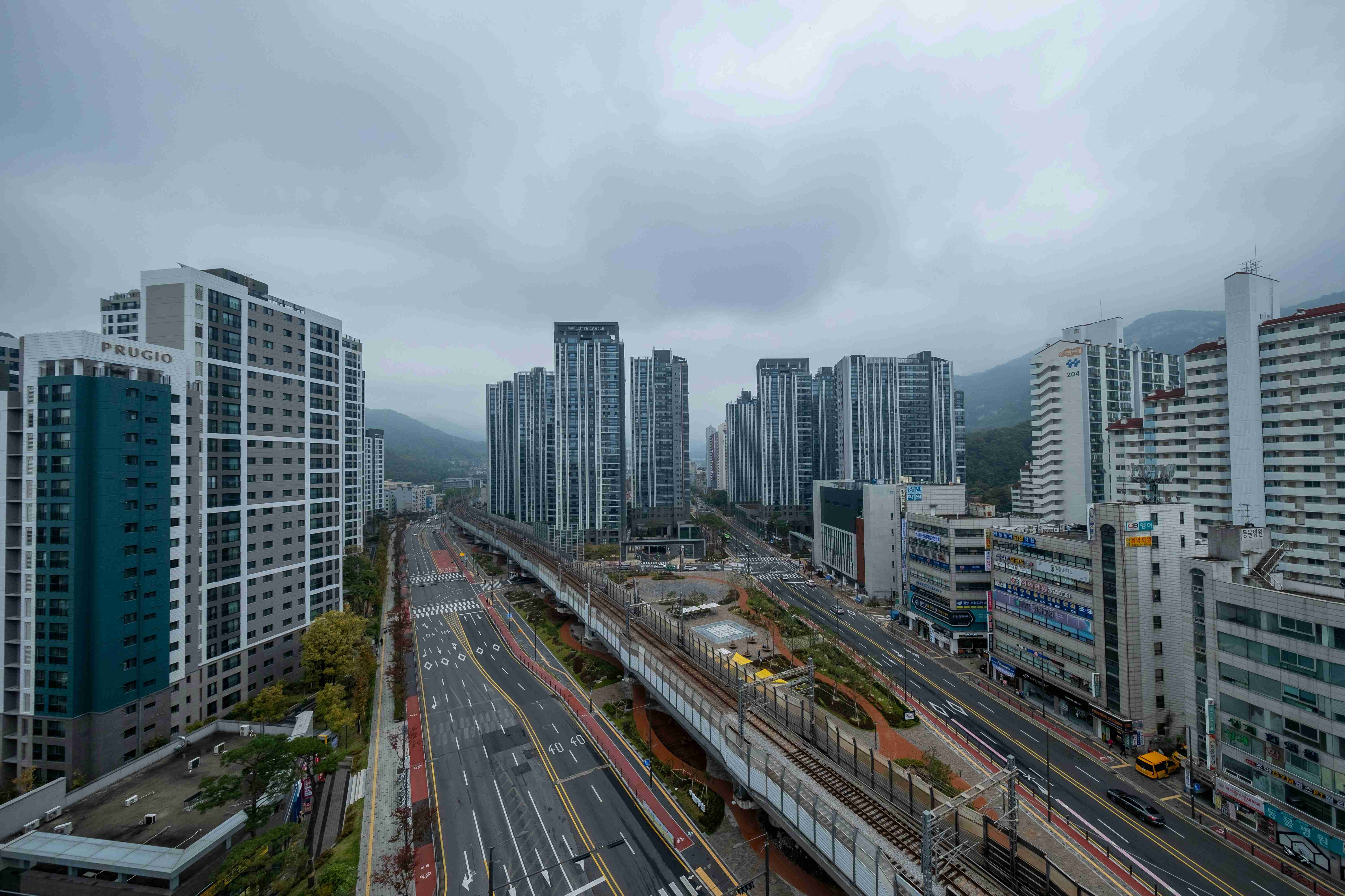 a view of a city with tall buildings