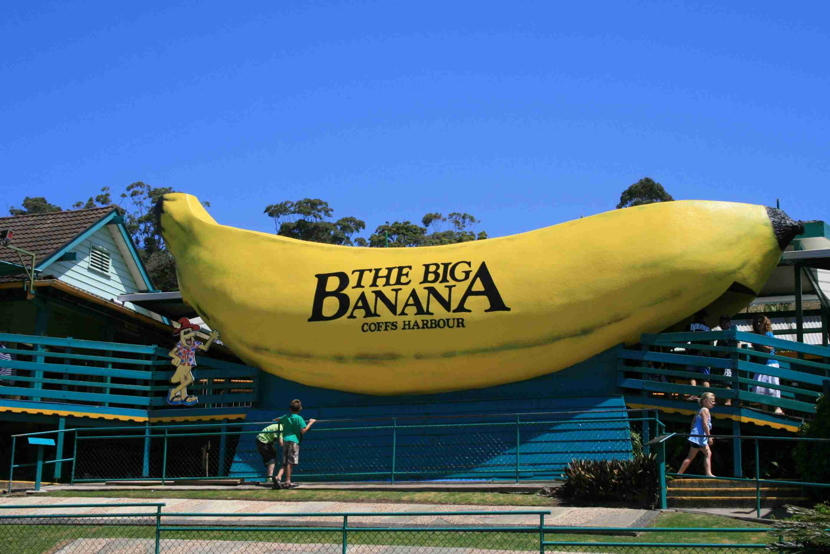 a-giant-banana-sign-in-front-of-a-building