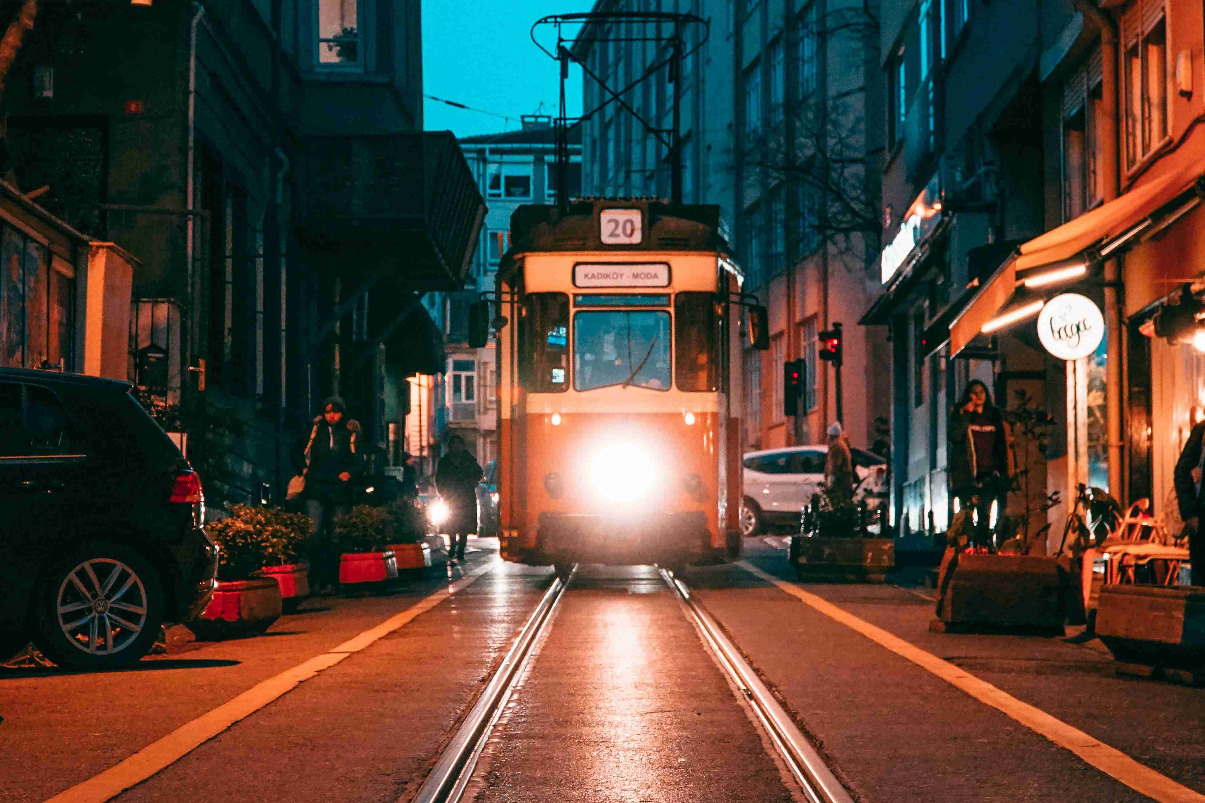 white and black tram on road