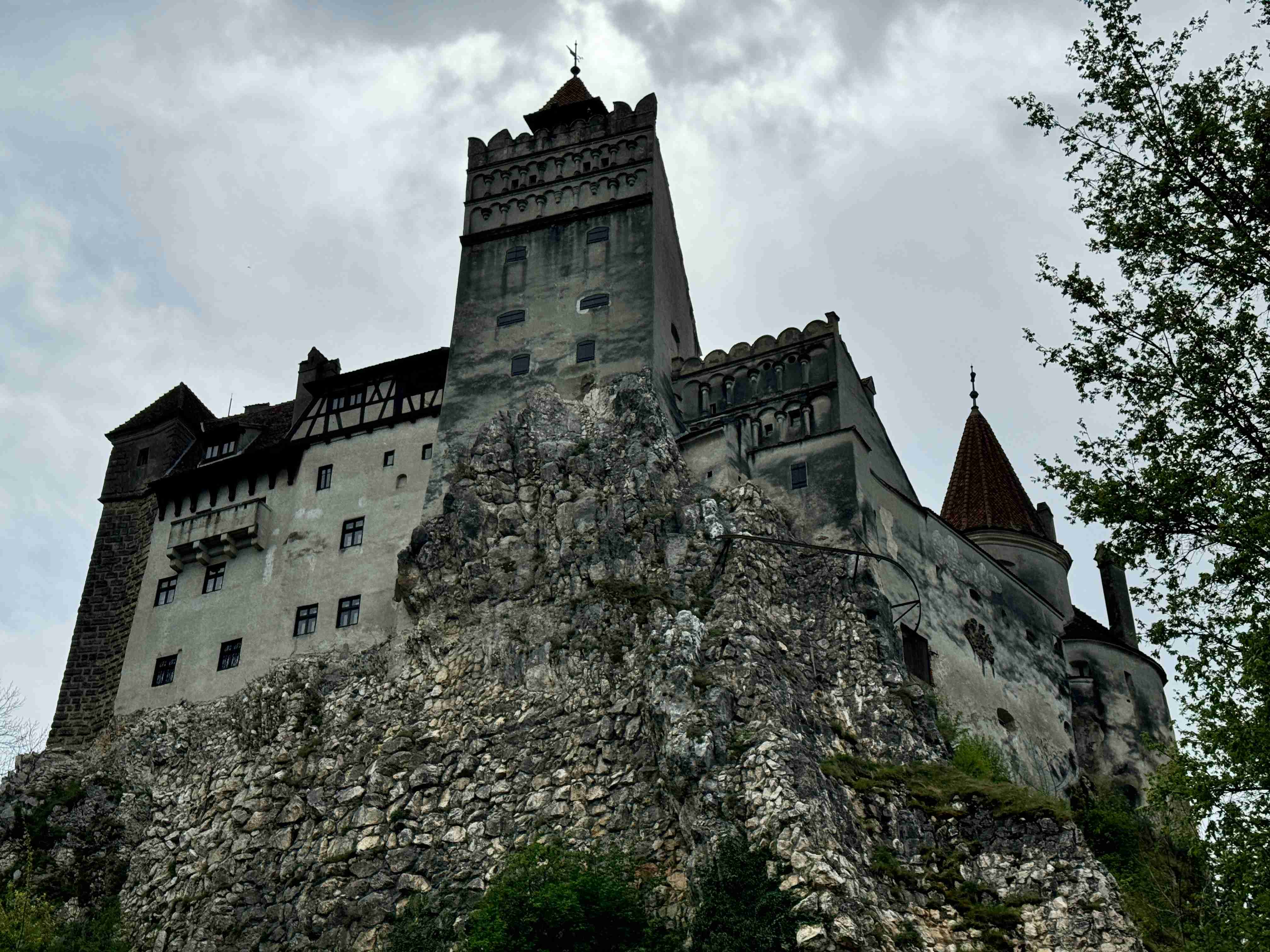 a-very-tall-castle-sitting-on-top-of-a-hill