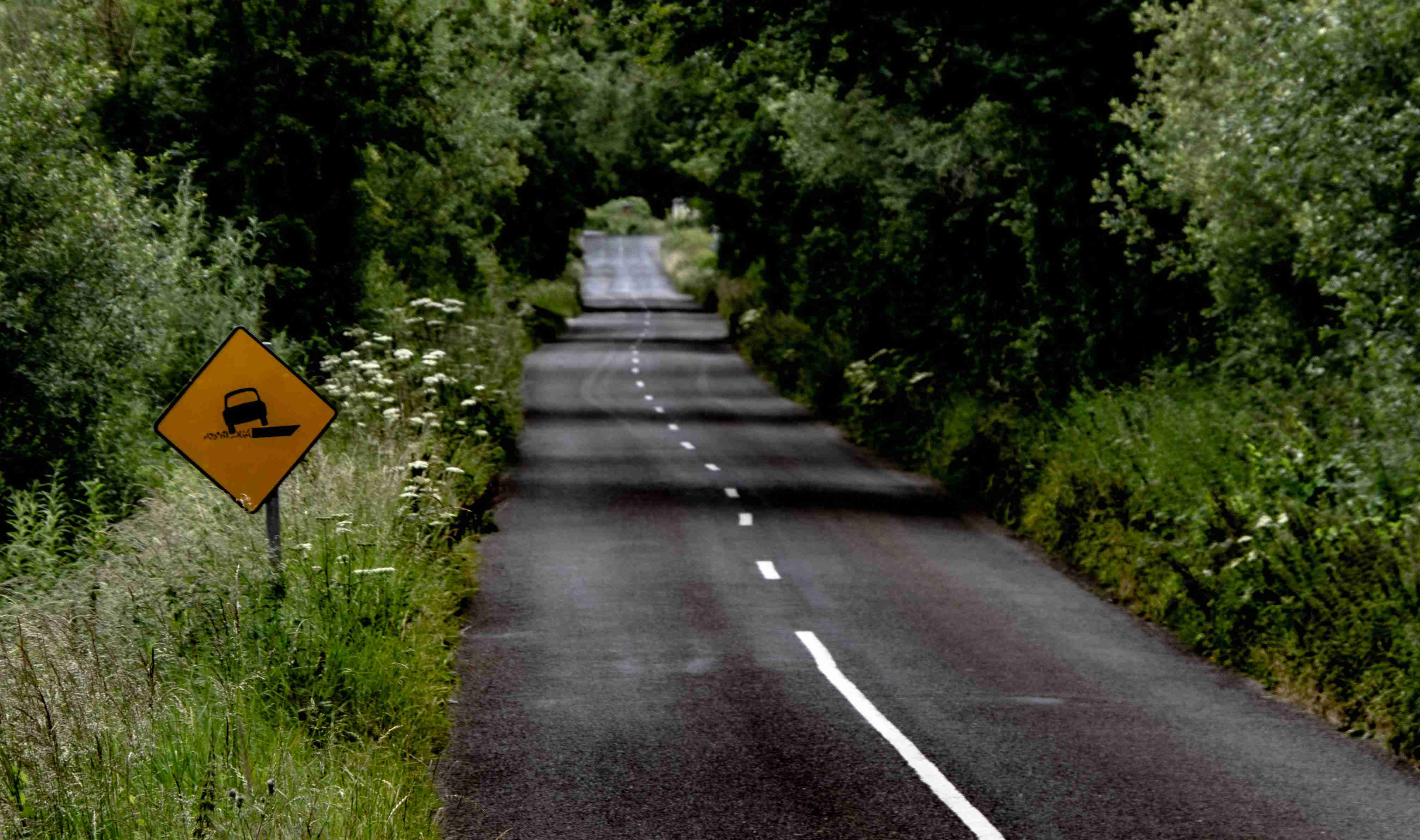 a road with a sign on it
