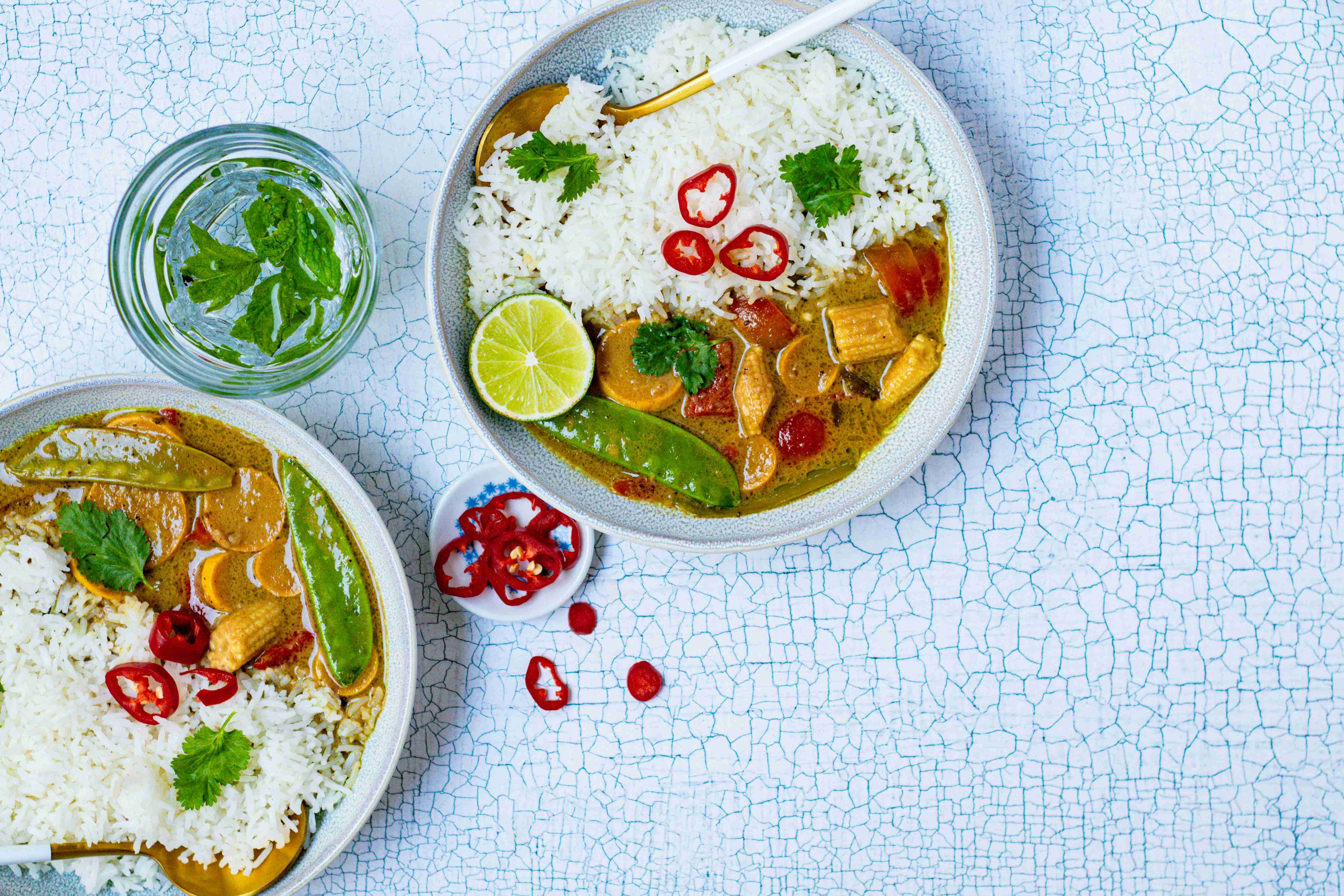 a couple of bowls of food on a table