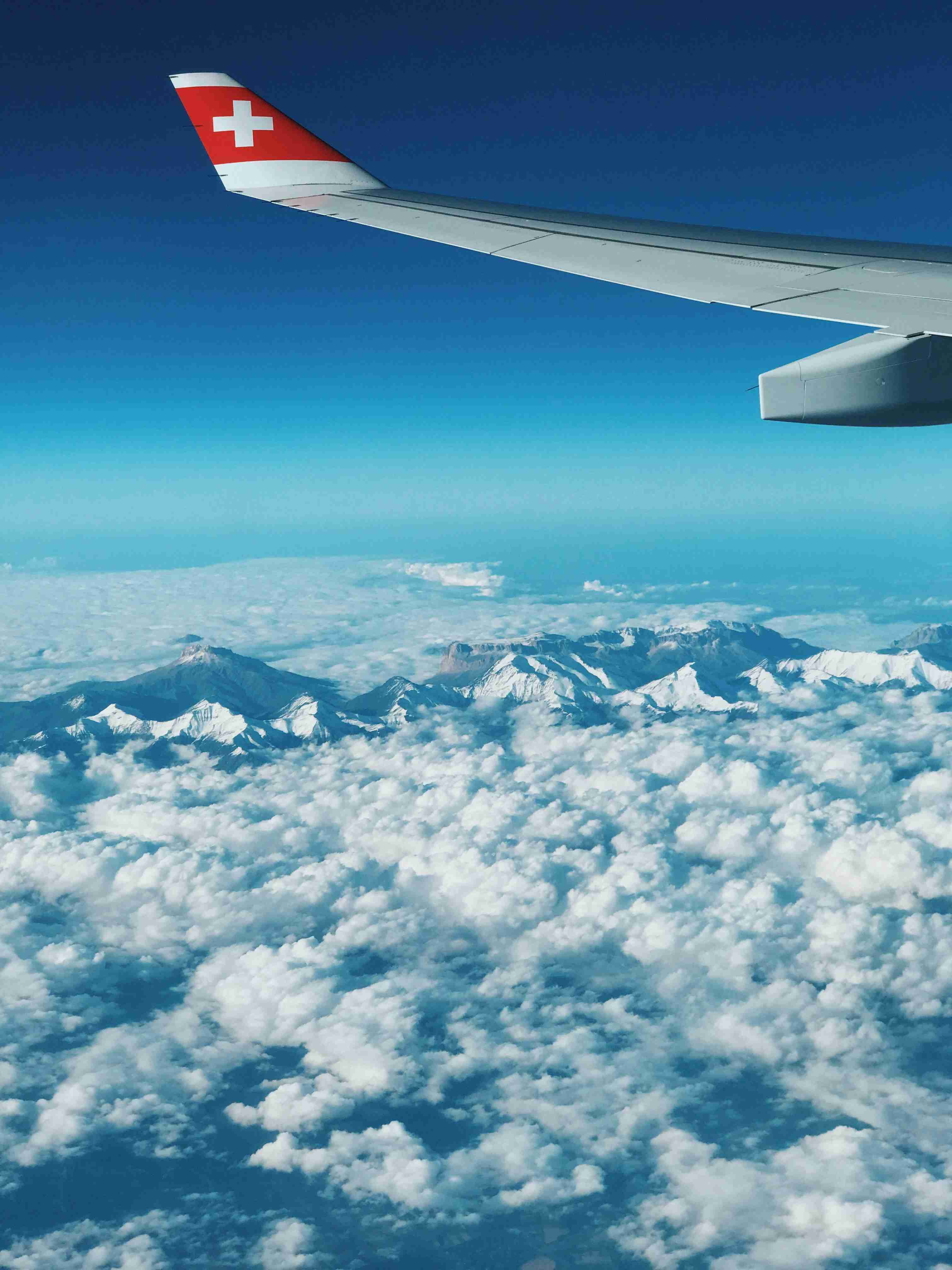 Scenic View from a Plane Over Snow-Capped Mountains