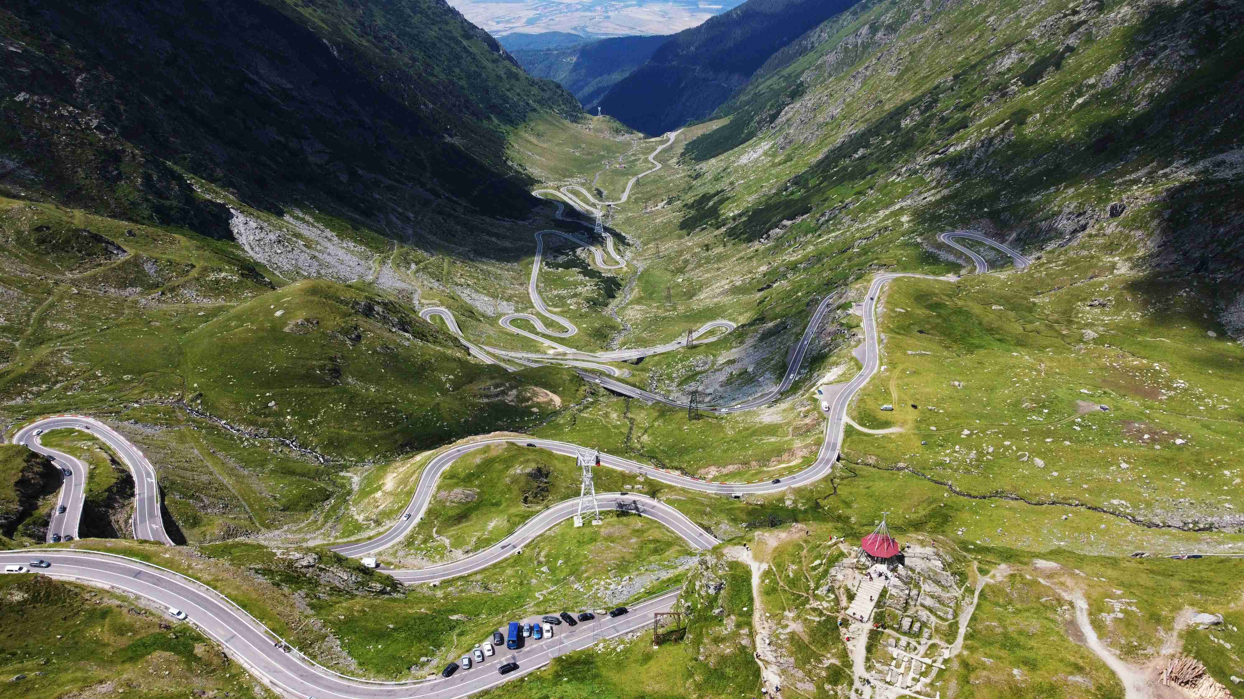 an aerial view of a winding road