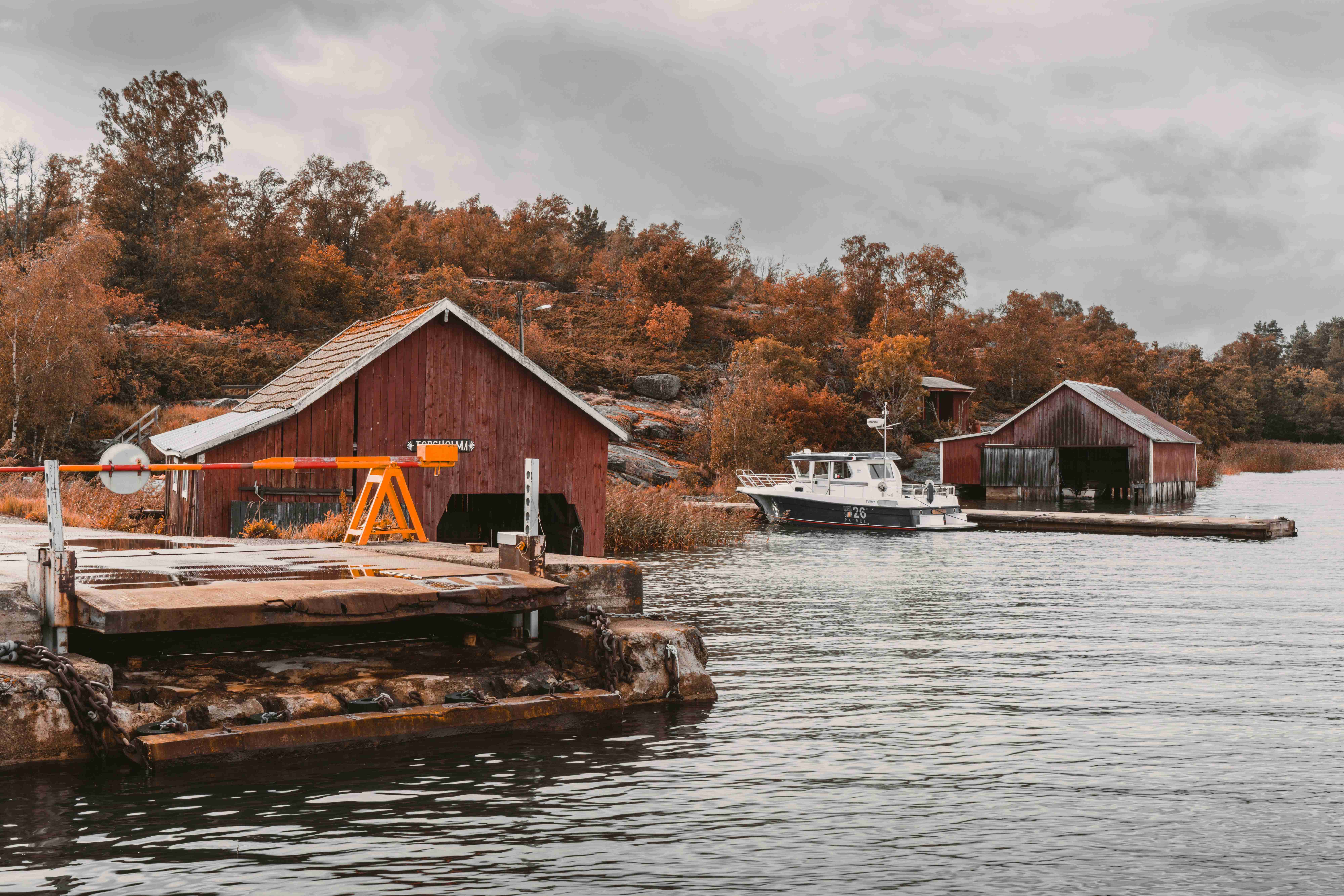 scenic-autumn-harbor-with-boat