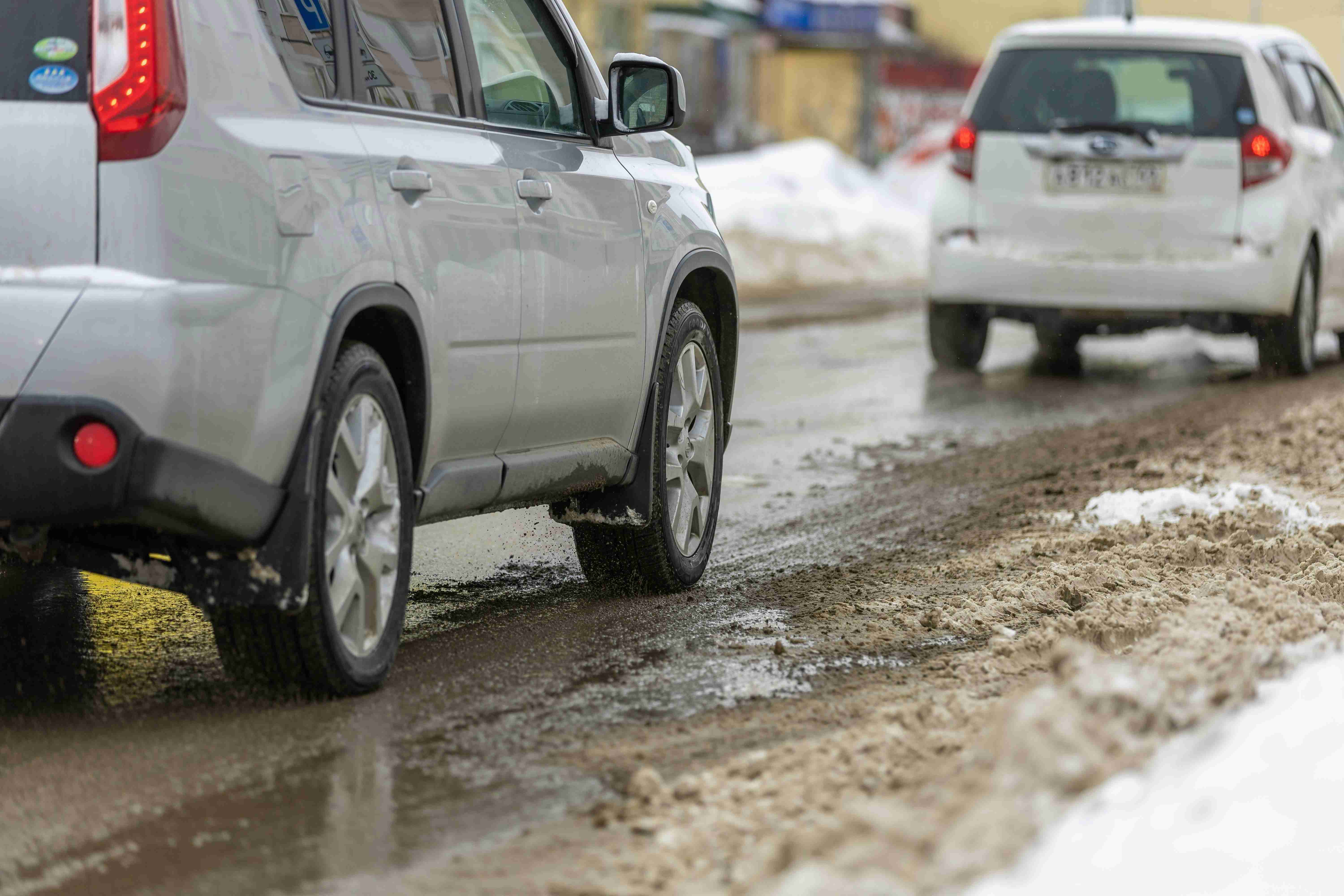 winter road conditions with cars
