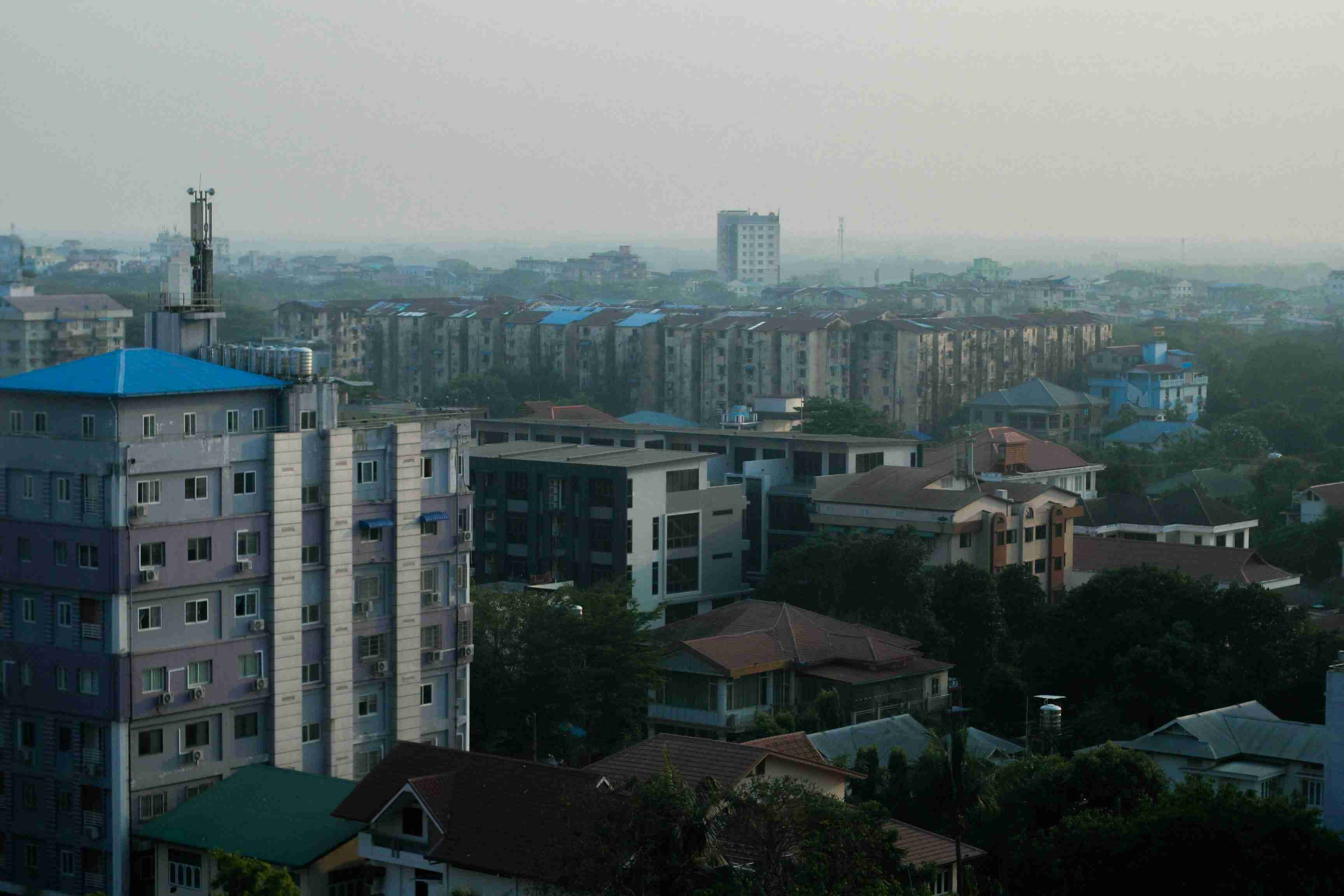 a-view-of-a-city-with-lots-of-tall-buildings