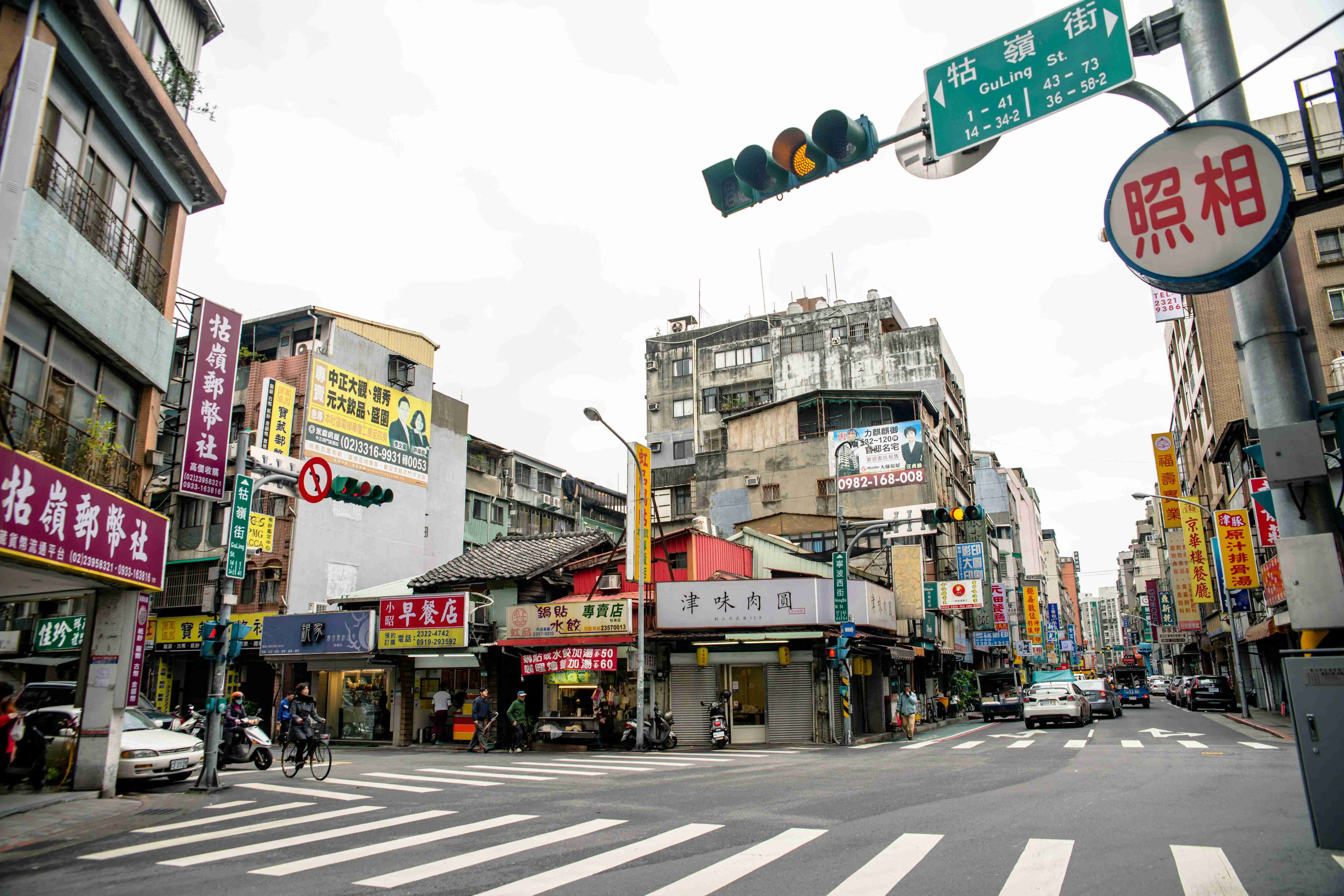 a-city-street-filled-with-lots-of-tall-buildings