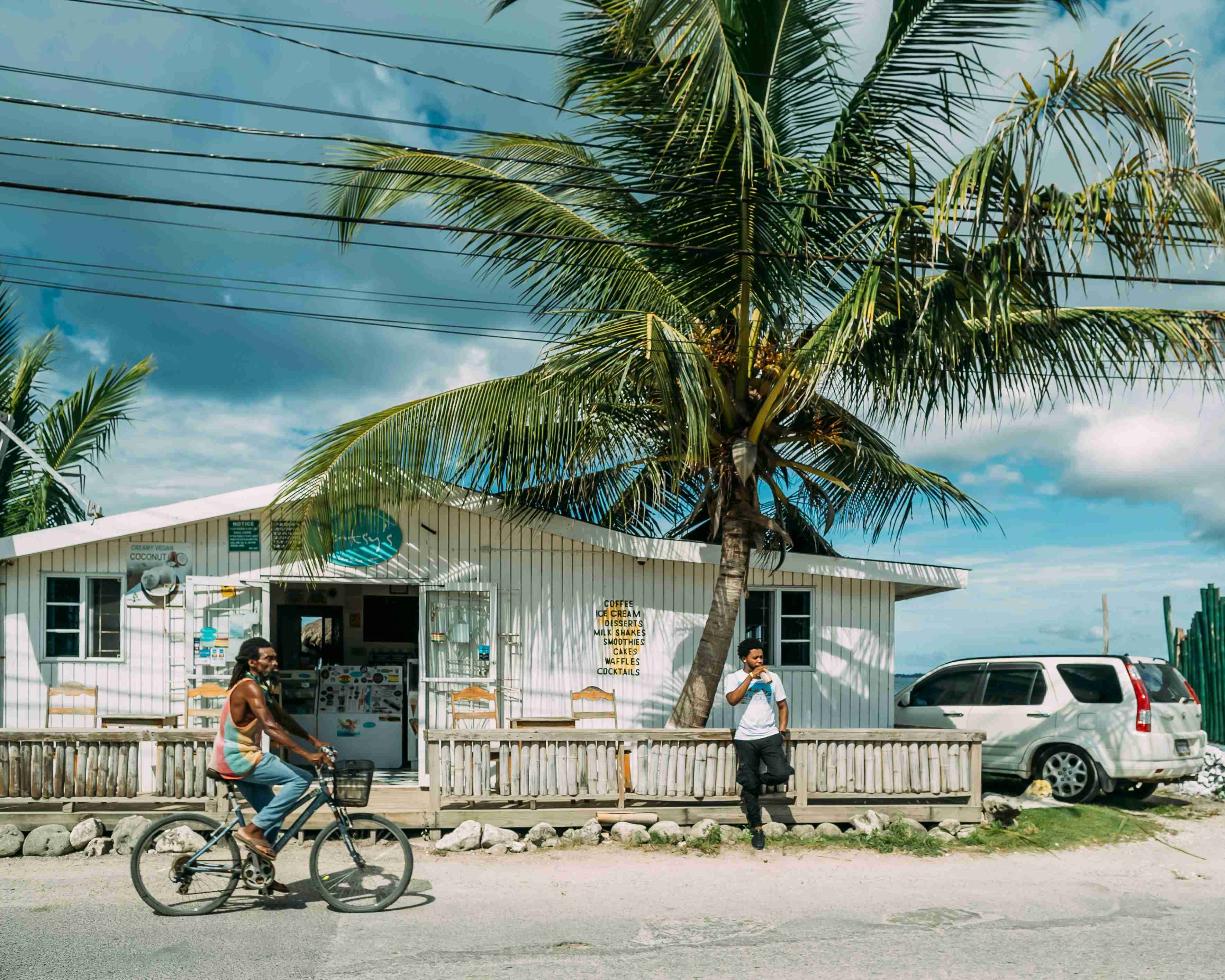 man in black shirt riding bicycle