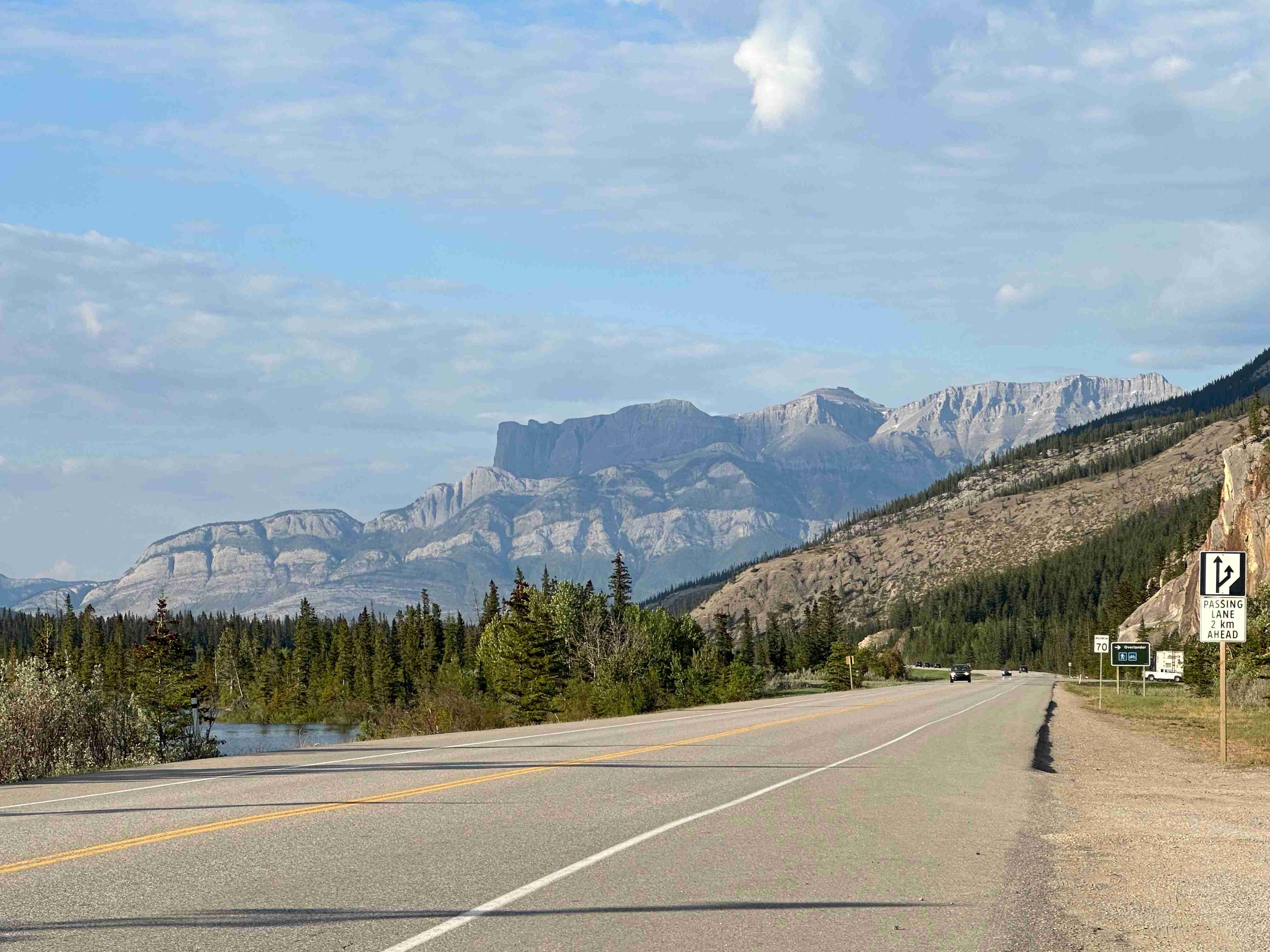 Scenic road with mountain views in Alberta, Canada.