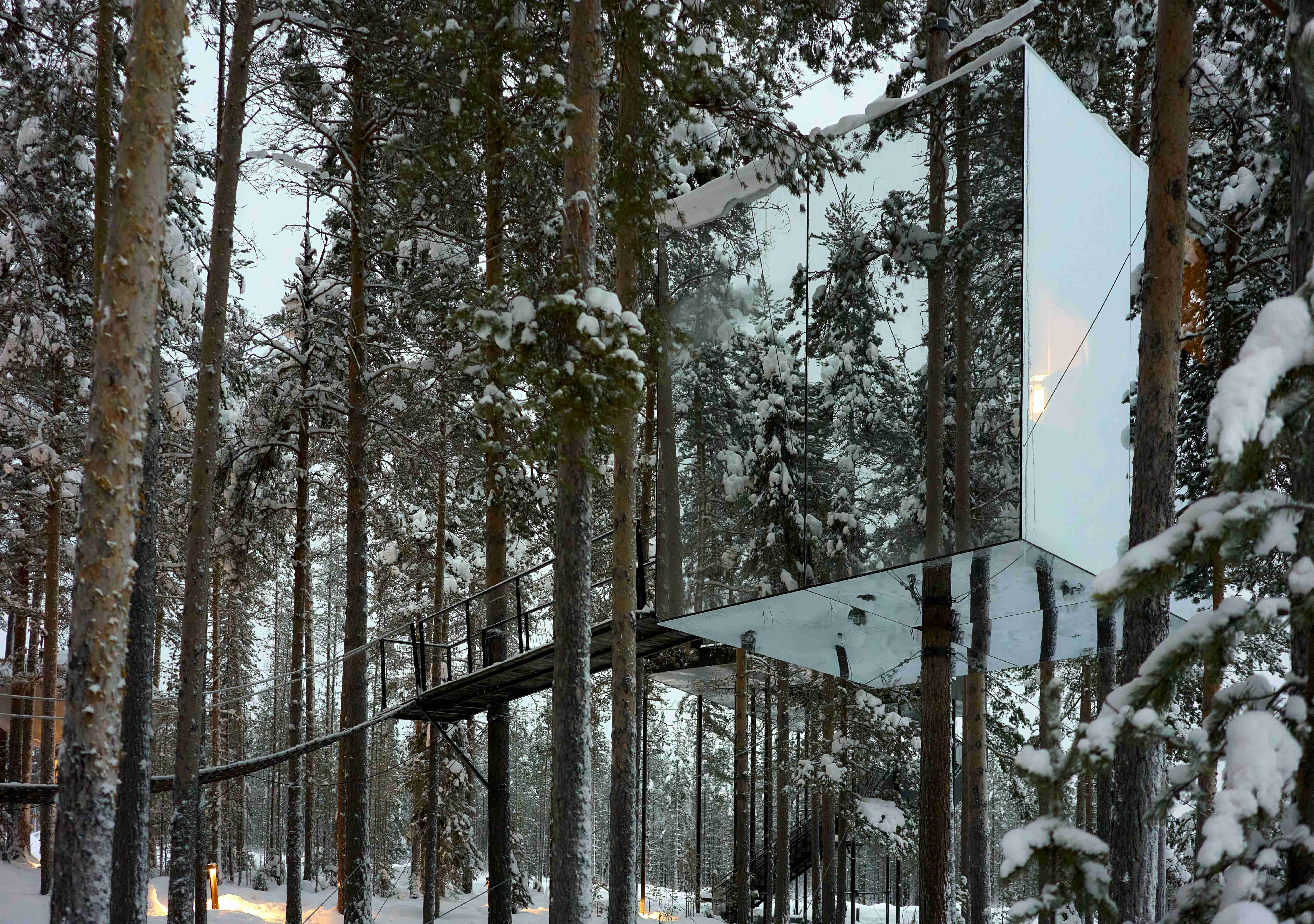 a-mirror-in-the-middle-of-a-snowy-forest